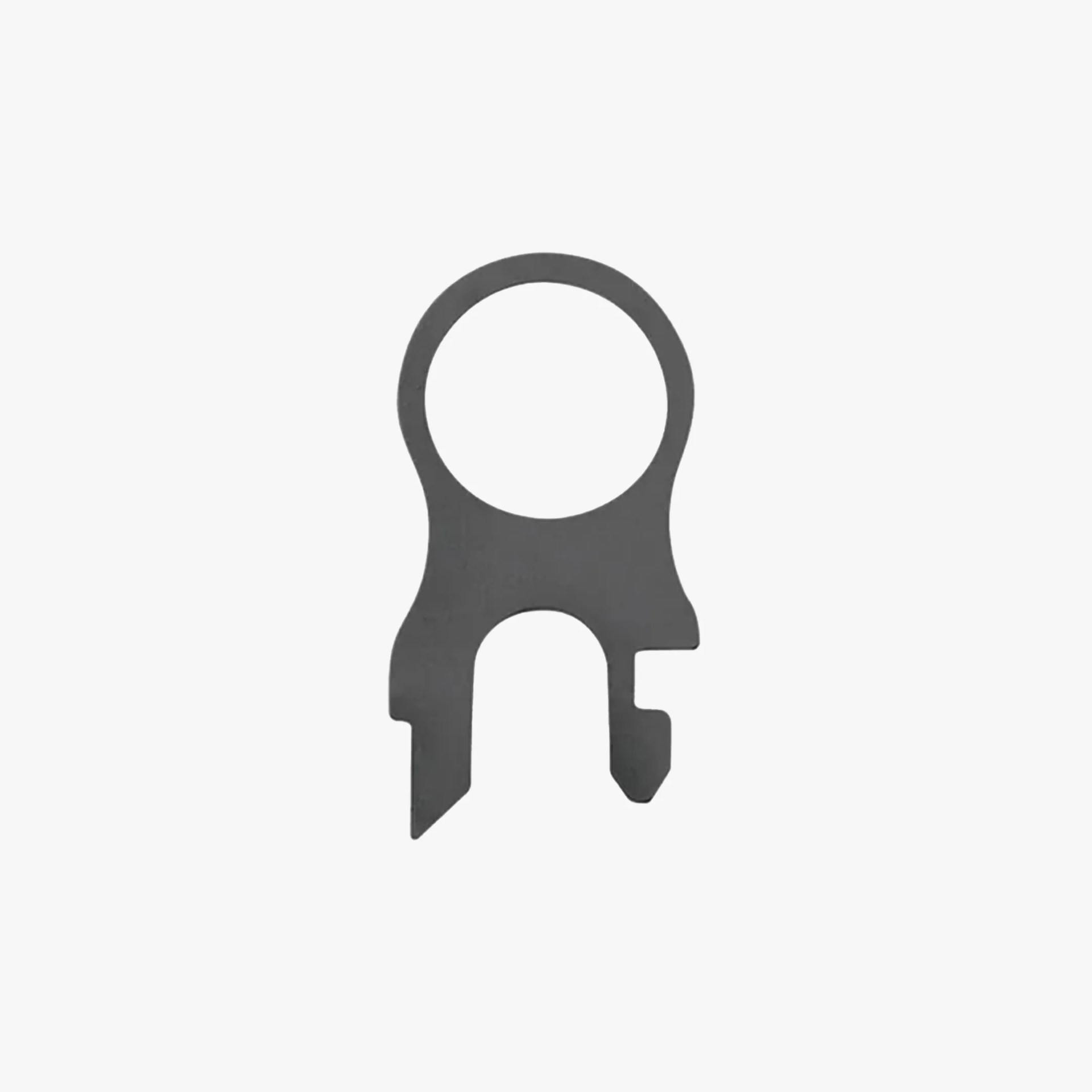Small black metal multi-tool with a circular hole and two pronged ends.