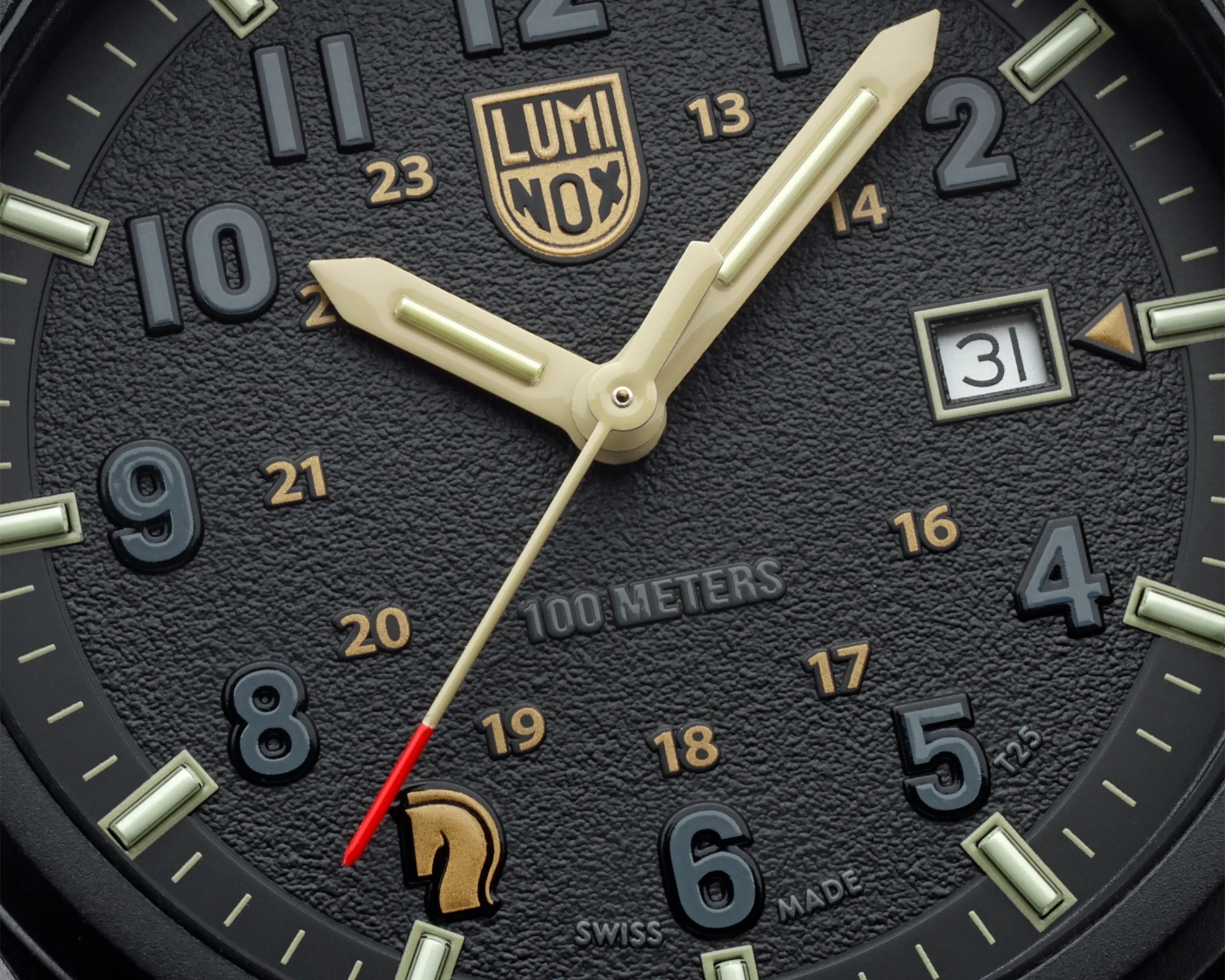 Close-up of a black textured Luminox watch face with beige hands, date window at 3 o'clock, and 100 meters water resistance marking.
