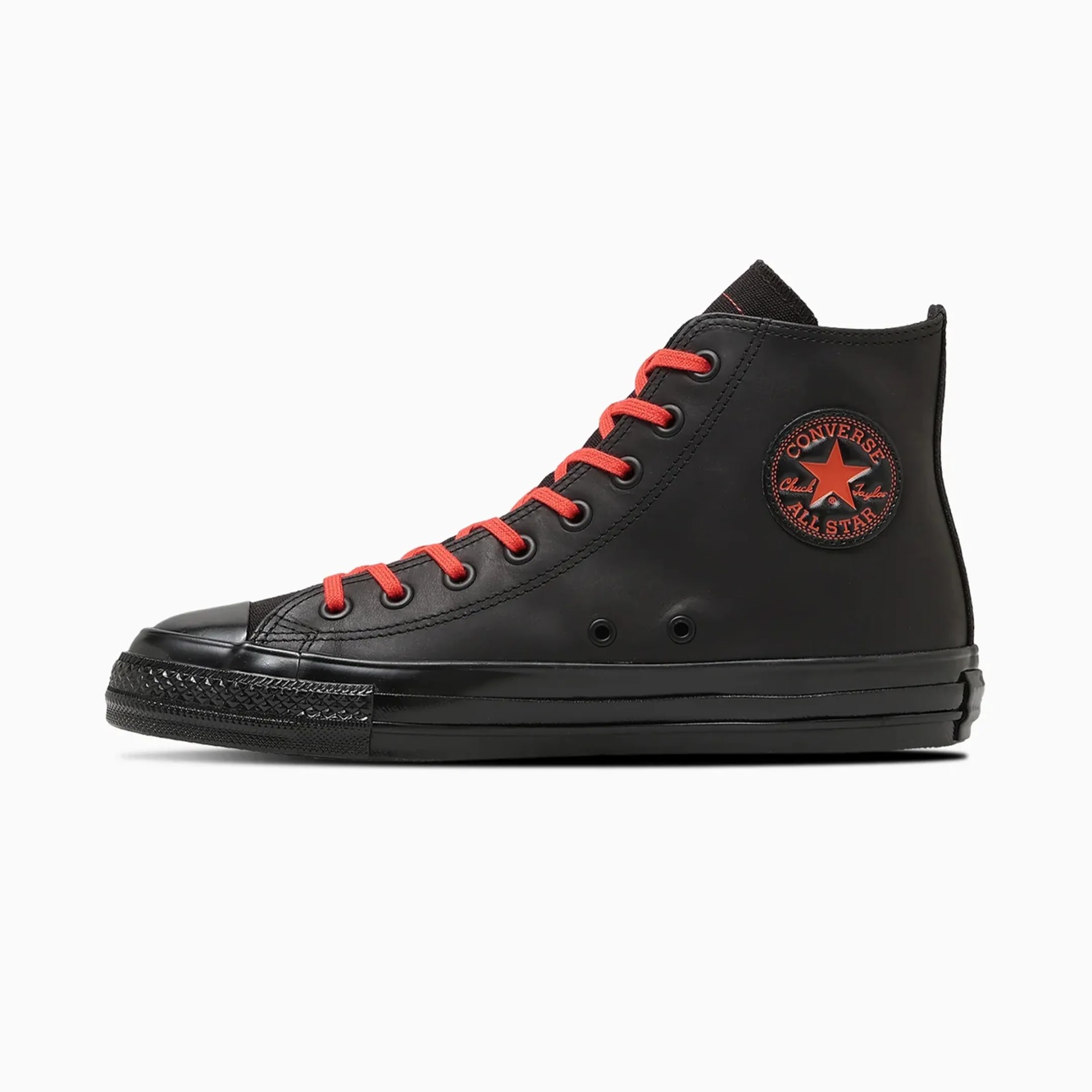 Black high-top Converse Chuck Taylor All Star sneaker with red laces and red logo patch on the side.