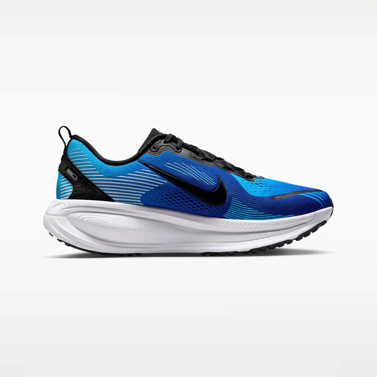 Blue and black Nike running shoe with white thick sole and black swoosh logo on side.