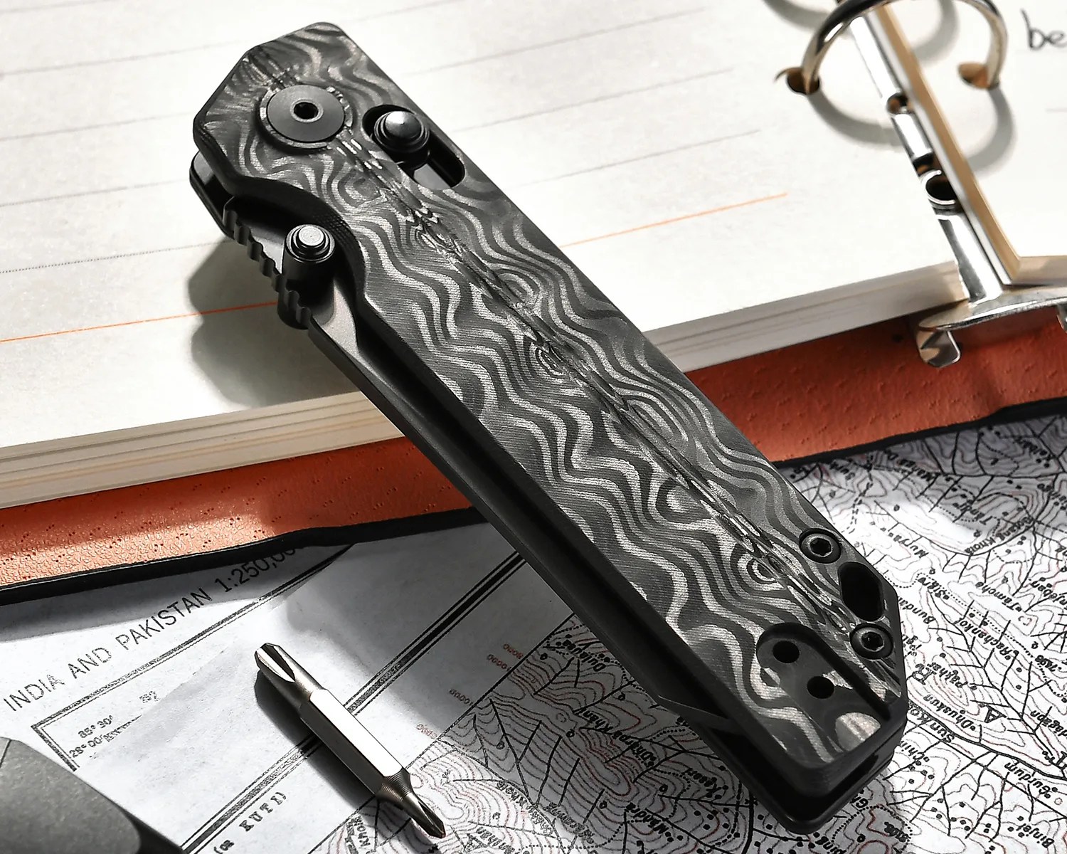 This Darkly Dazzling New Ken Onion Knife Taps an Ancient Technique
