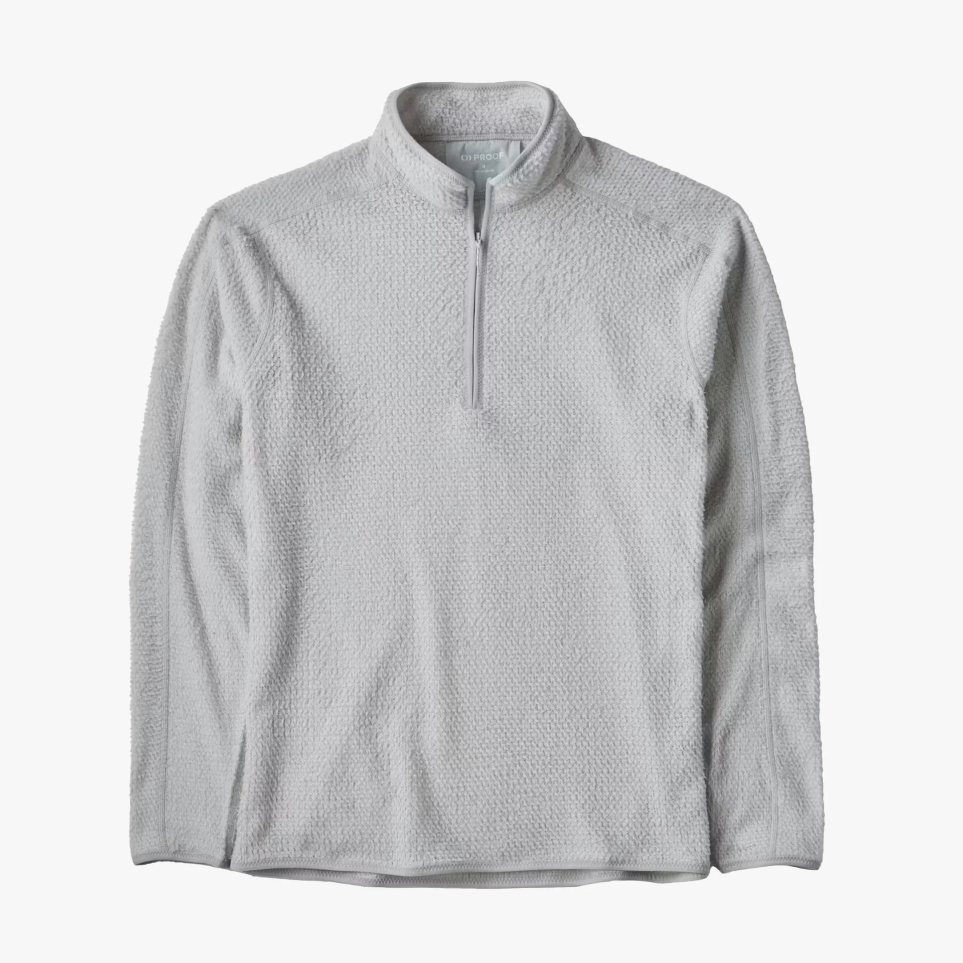 Light gray textured fleece pullover with a quarter-zip and stand collar.