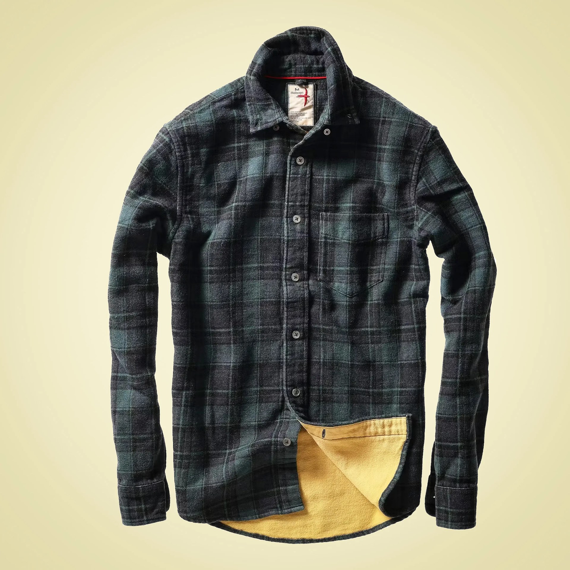 Dark green and black plaid button-up shirt with a yellow inner lining and a chest pocket.