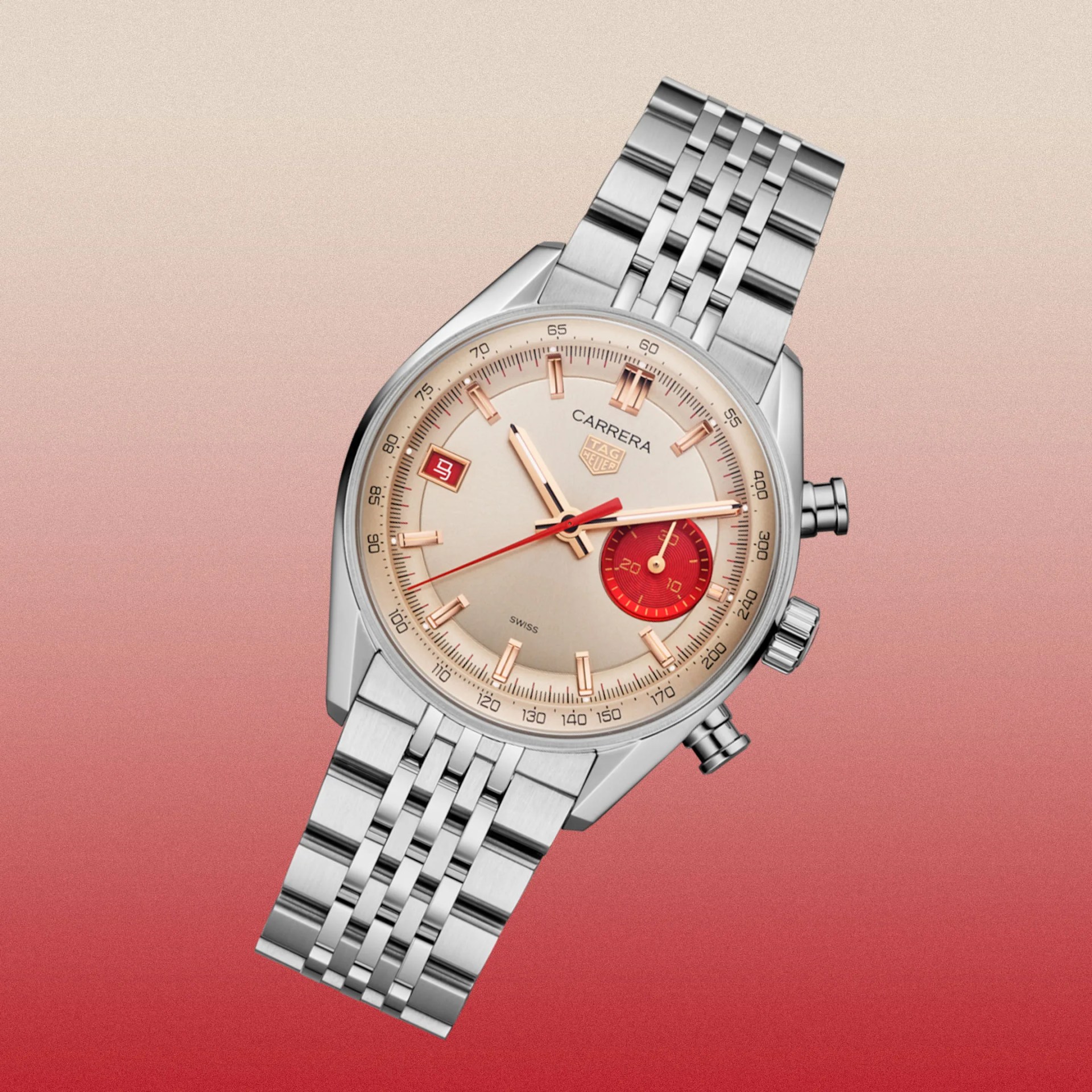 Silver TAG Heuer Carrera wristwatch with cream dial, red subdial, red date window, and stainless steel bracelet.