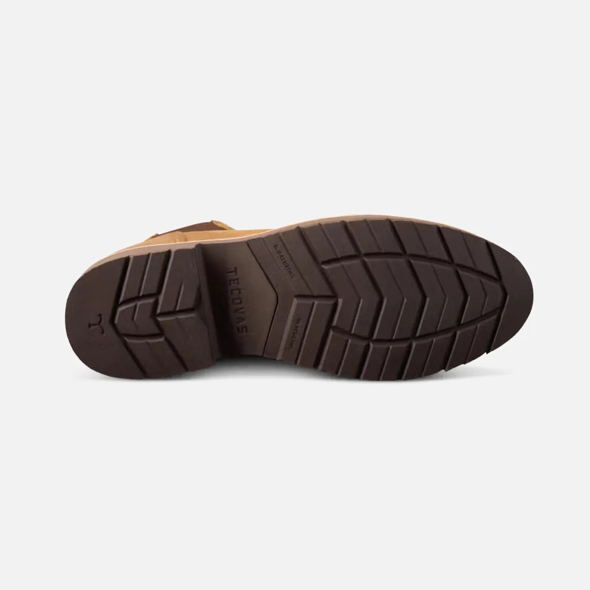 Dark brown rubber sole of a boot with deep tread patterns and the brand name "TECONAS" embossed.
