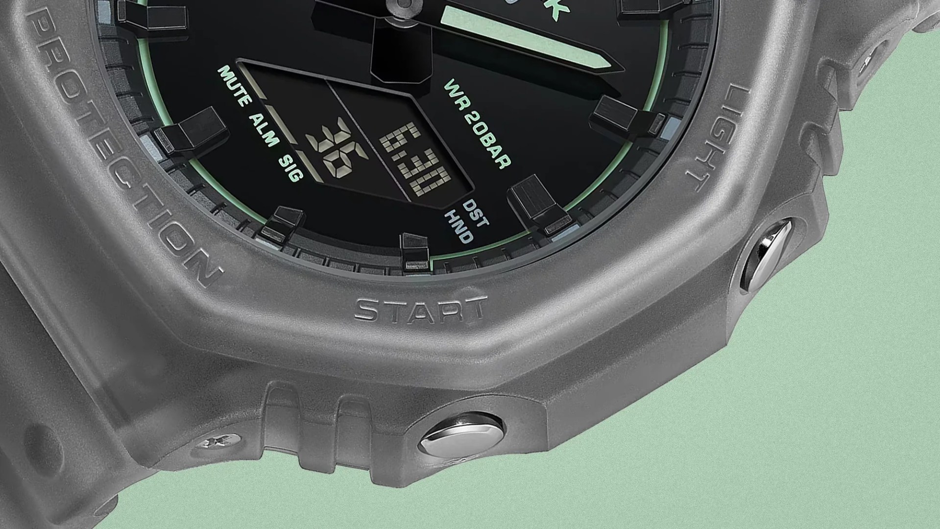 Close-up of a gray digital-analog watch face showing "WR 20BAR" and buttons labeled "START" and "LIGHT.
