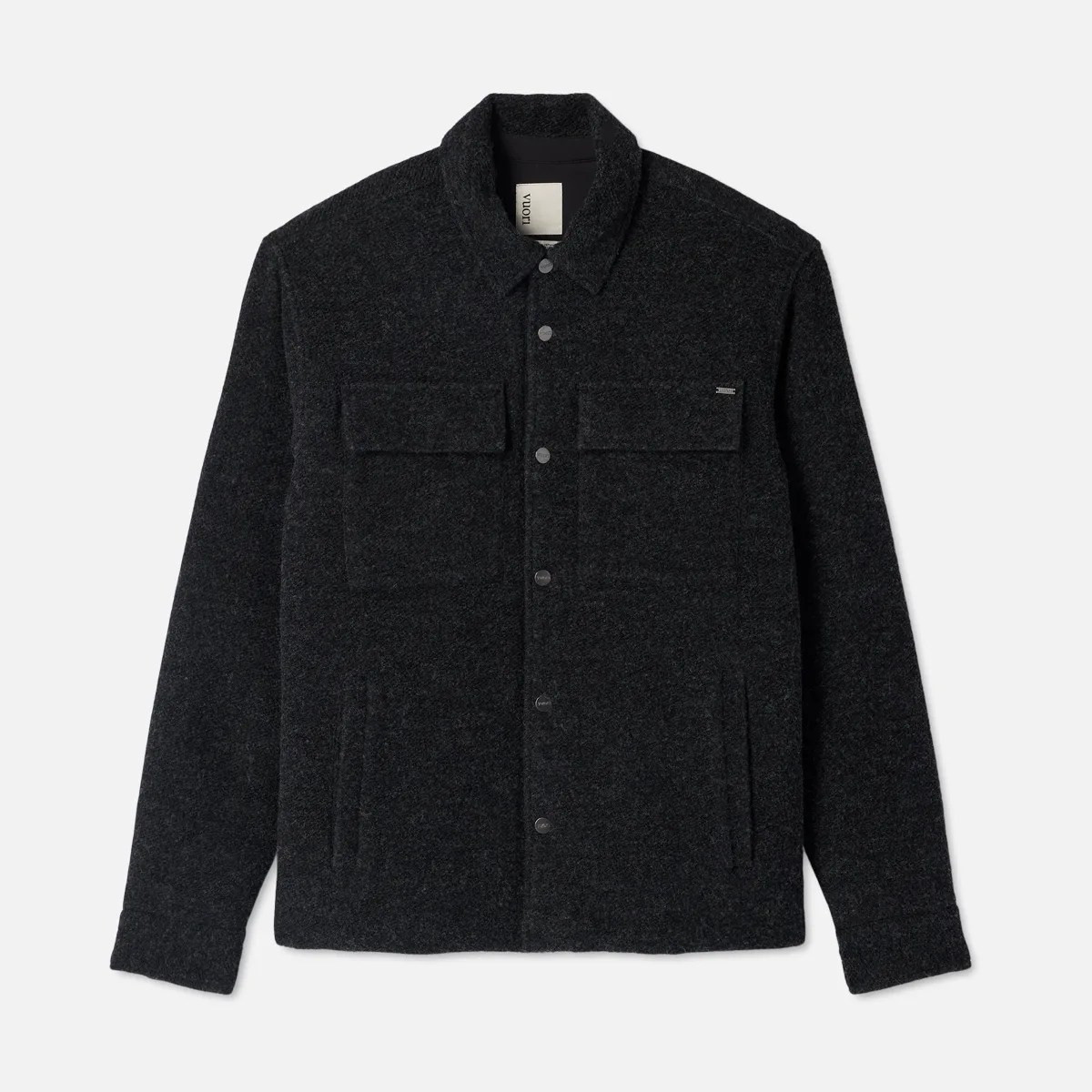 Dark charcoal gray wool blend button-up jacket with two chest flap pockets and side pockets.