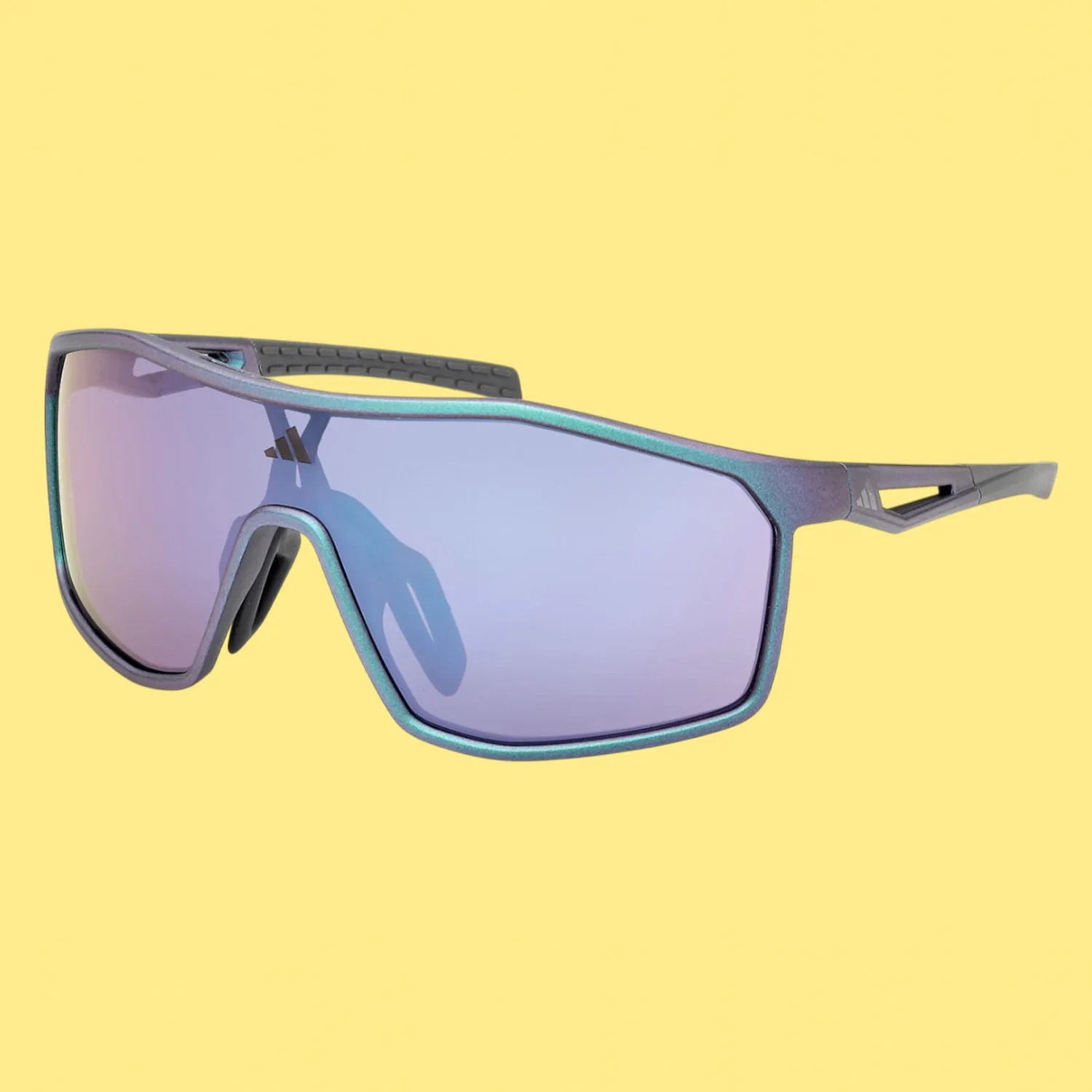 Sporty wraparound sunglasses with iridescent blue-purple frame and mirrored lenses on a yellow background.