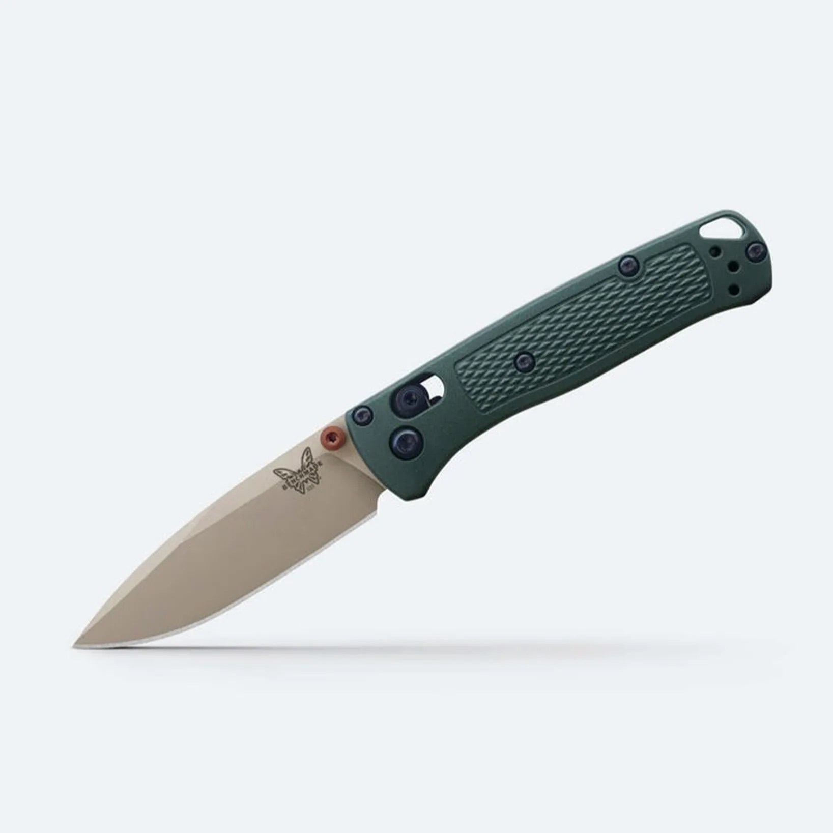 Folding knife with a tan blade and dark green textured handle, featuring a butterfly logo on the blade.