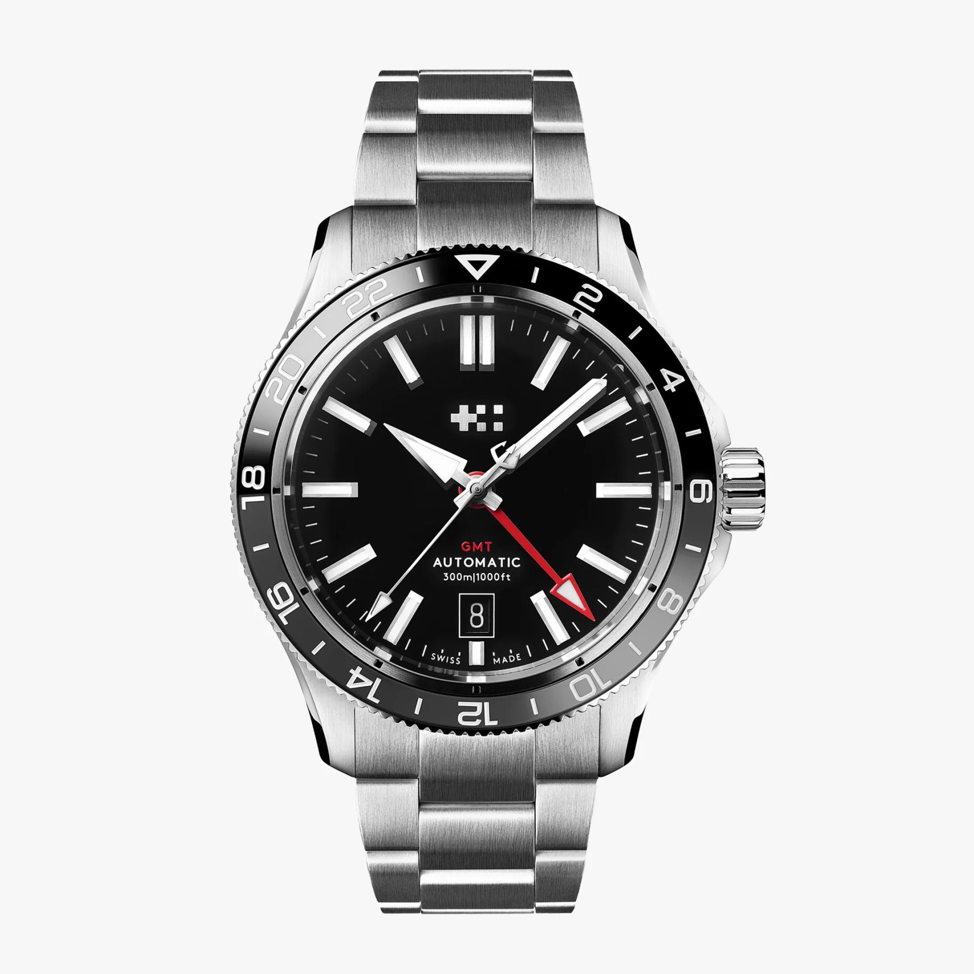 Stainless steel GMT automatic watch with black dial, white markers, red GMT hand, and date window at 6 o'clock.