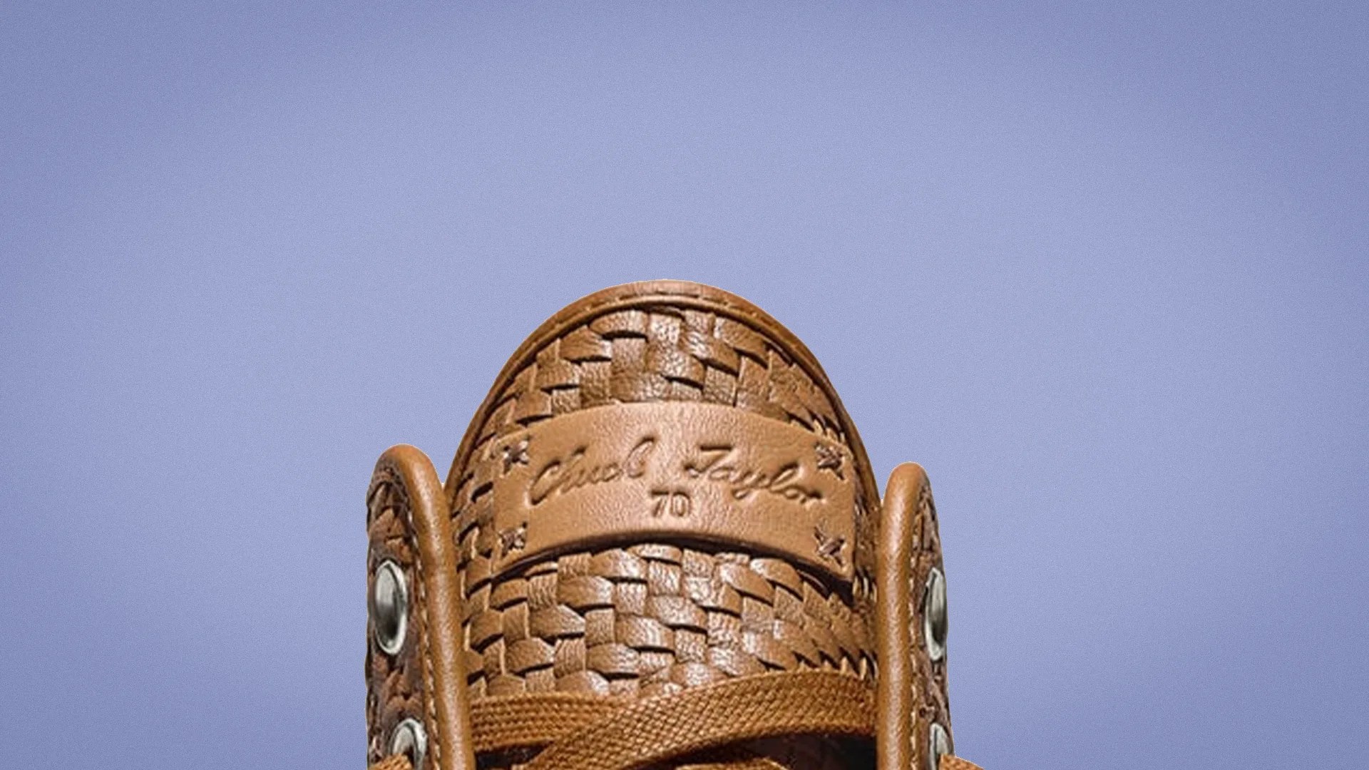 chuck taylor woven leather tongue and collar on a purple background