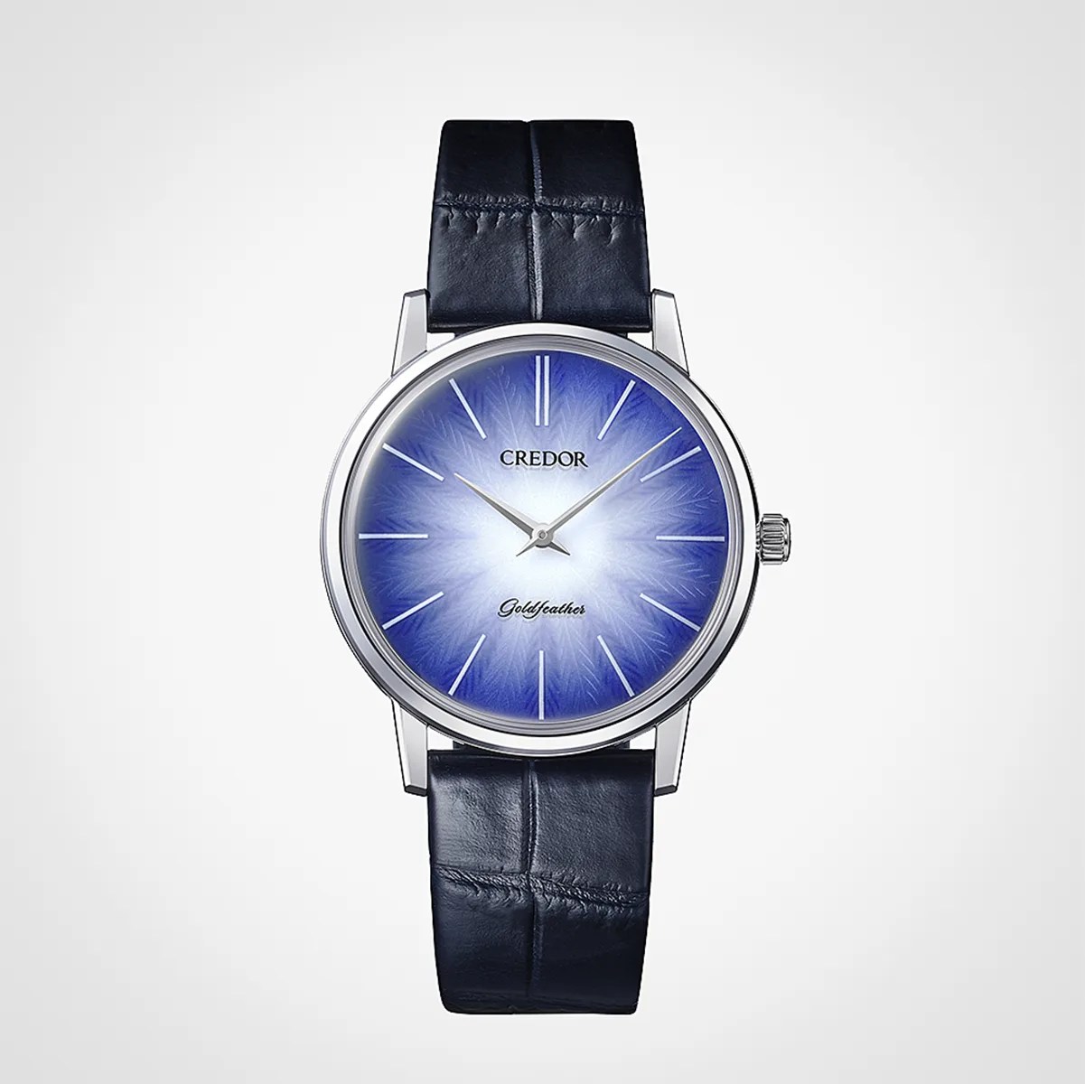 Silver wristwatch with a blue gradient dial featuring leaf patterns and a black leather strap.