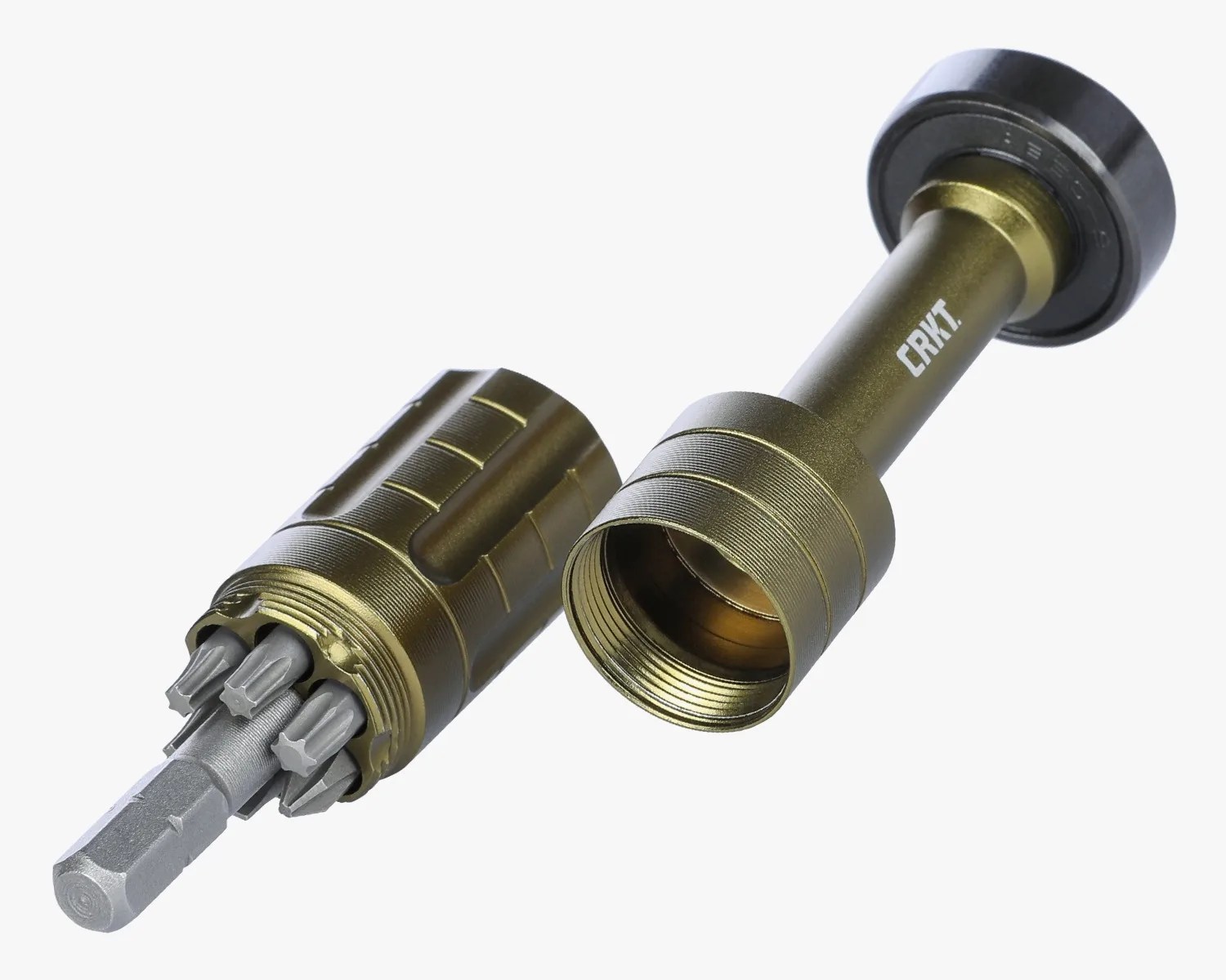 Compact olive-green metal multi-bit screwdriver with bits stored inside the open handle.