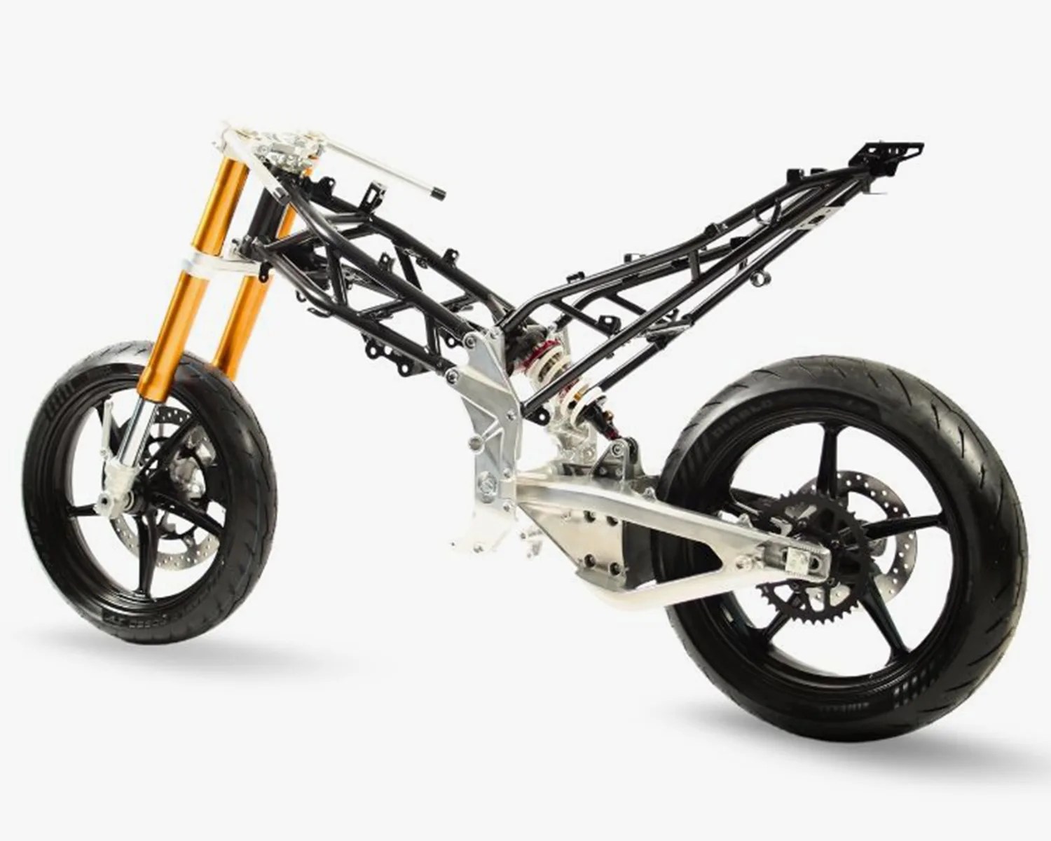 Black motorcycle frame with gold front forks and black wheels without body panels.
