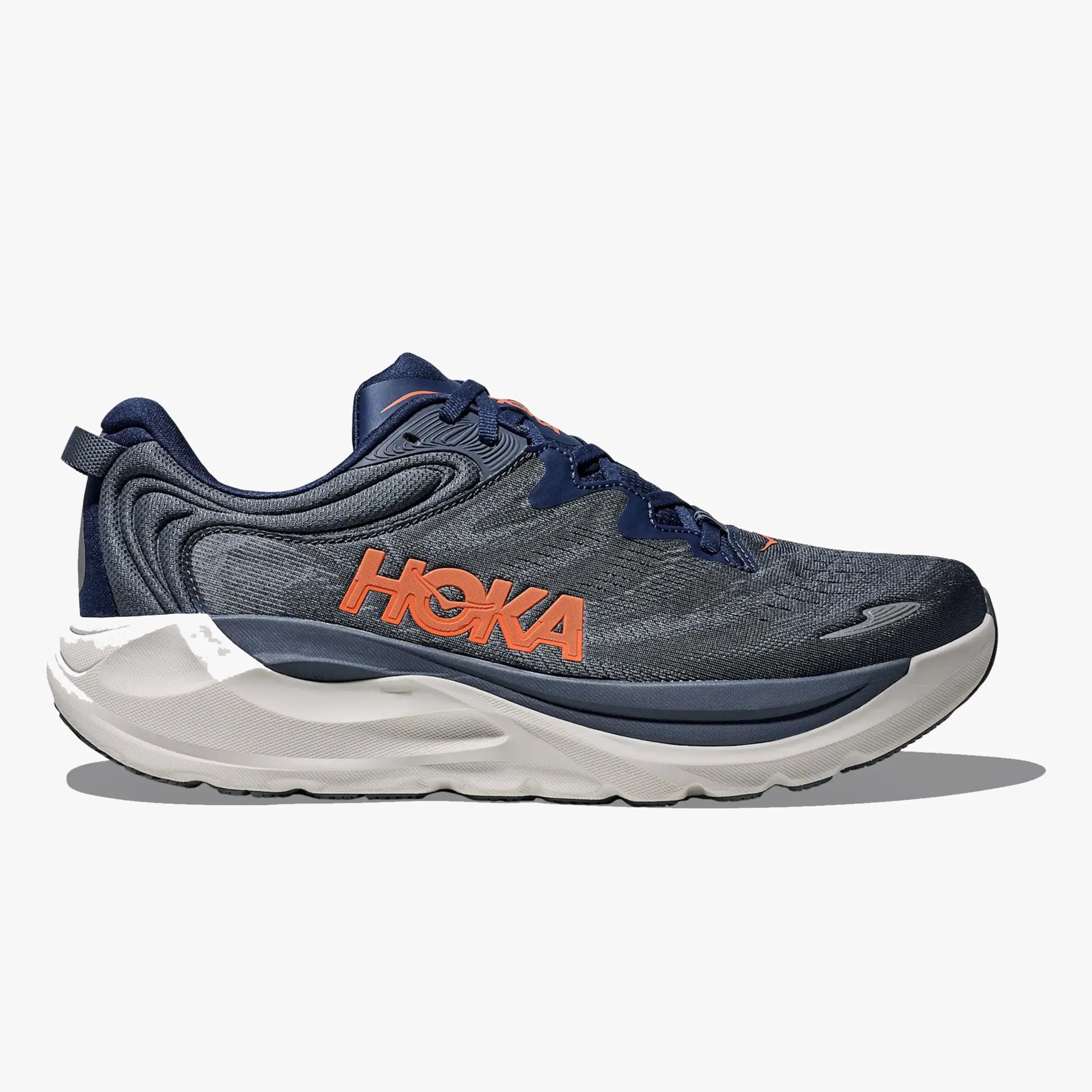 Navy and gray HOKA running shoe with orange logo and white cushioned sole.