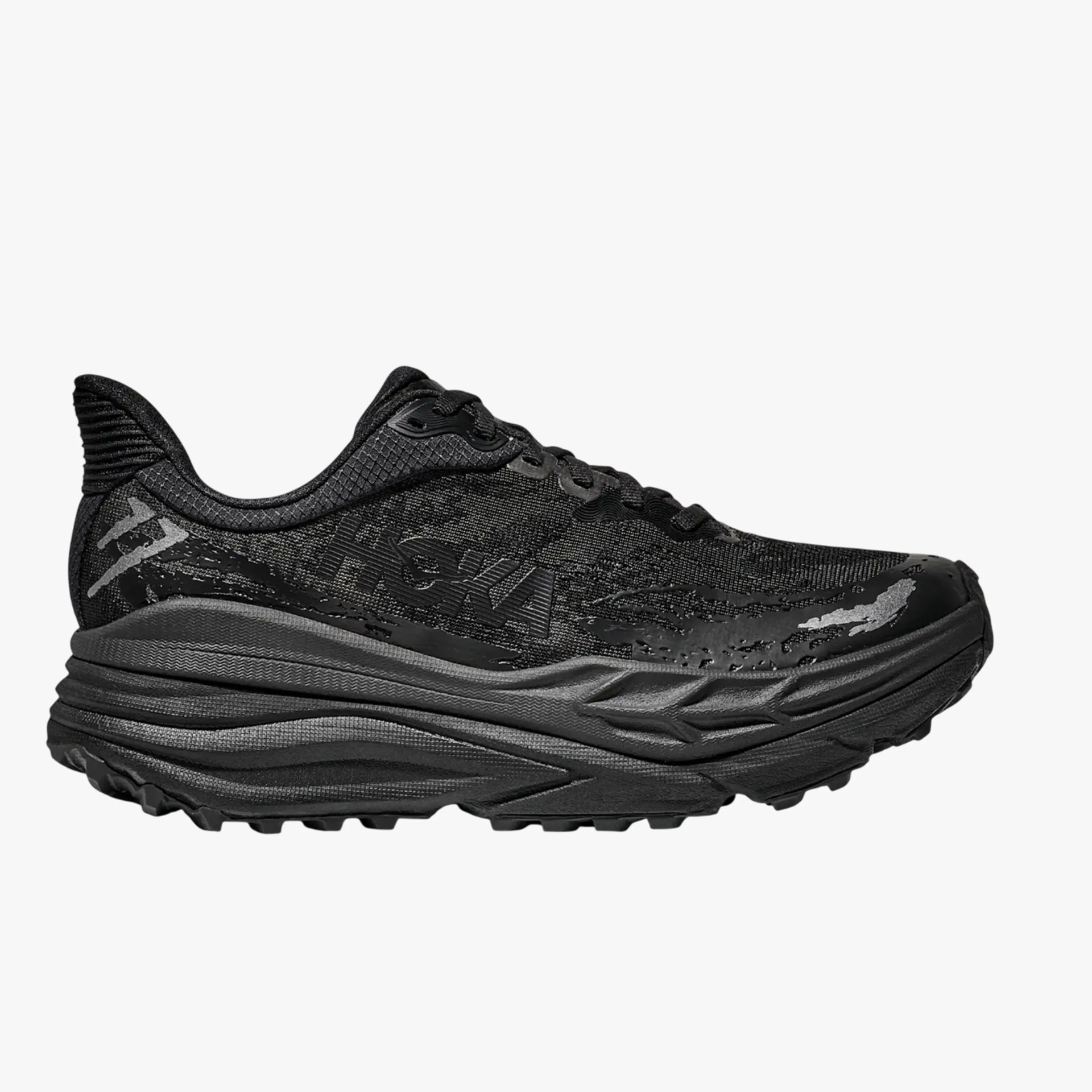 All-black Hoka running shoe with thick cushioned sole and textured upper.