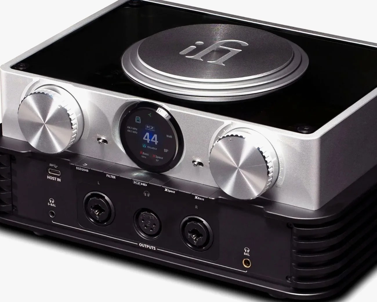 Silver and black iFi audio DAC and headphone amplifier with dual large control knobs and a circular digital display.