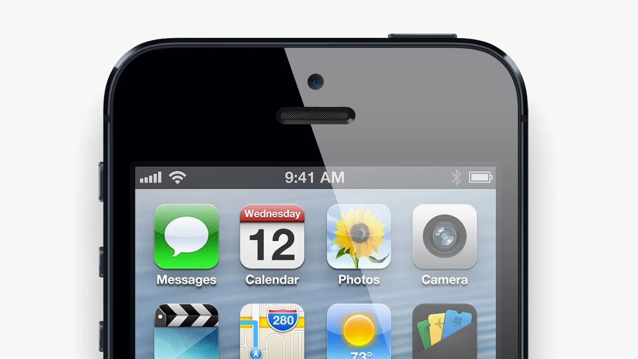 Top portion of a black smartphone screen showing app icons for Messages, Calendar, Photos, and Camera.