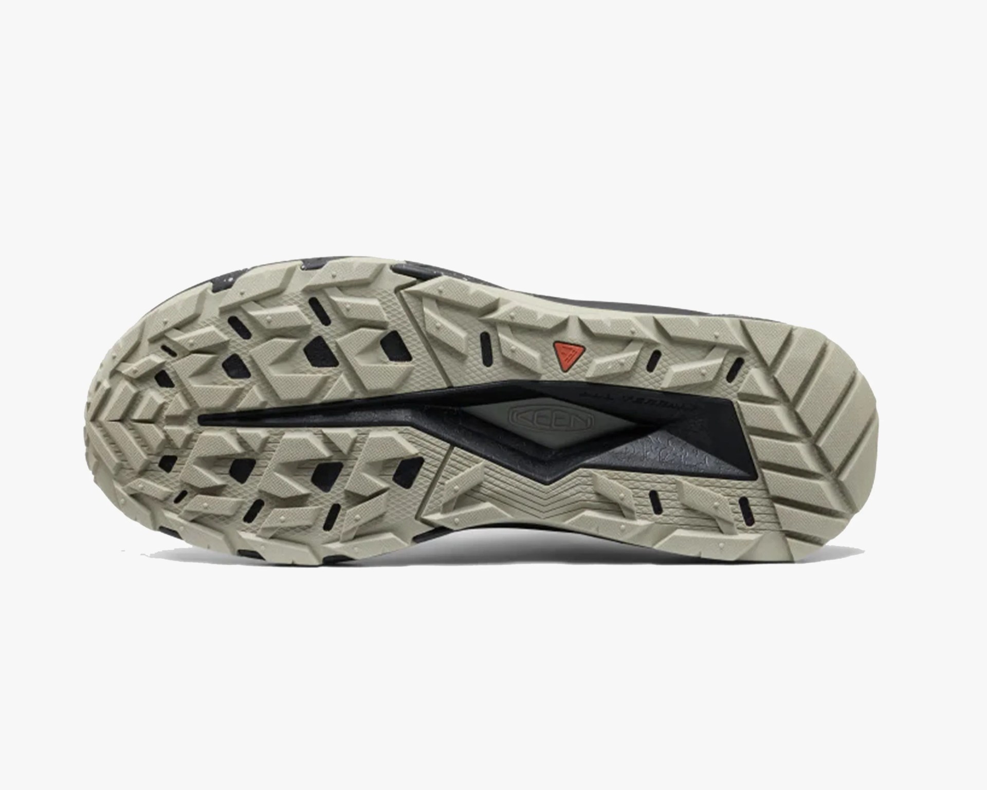 Beige and black rugged shoe sole with deep treads and a small red triangular logo.