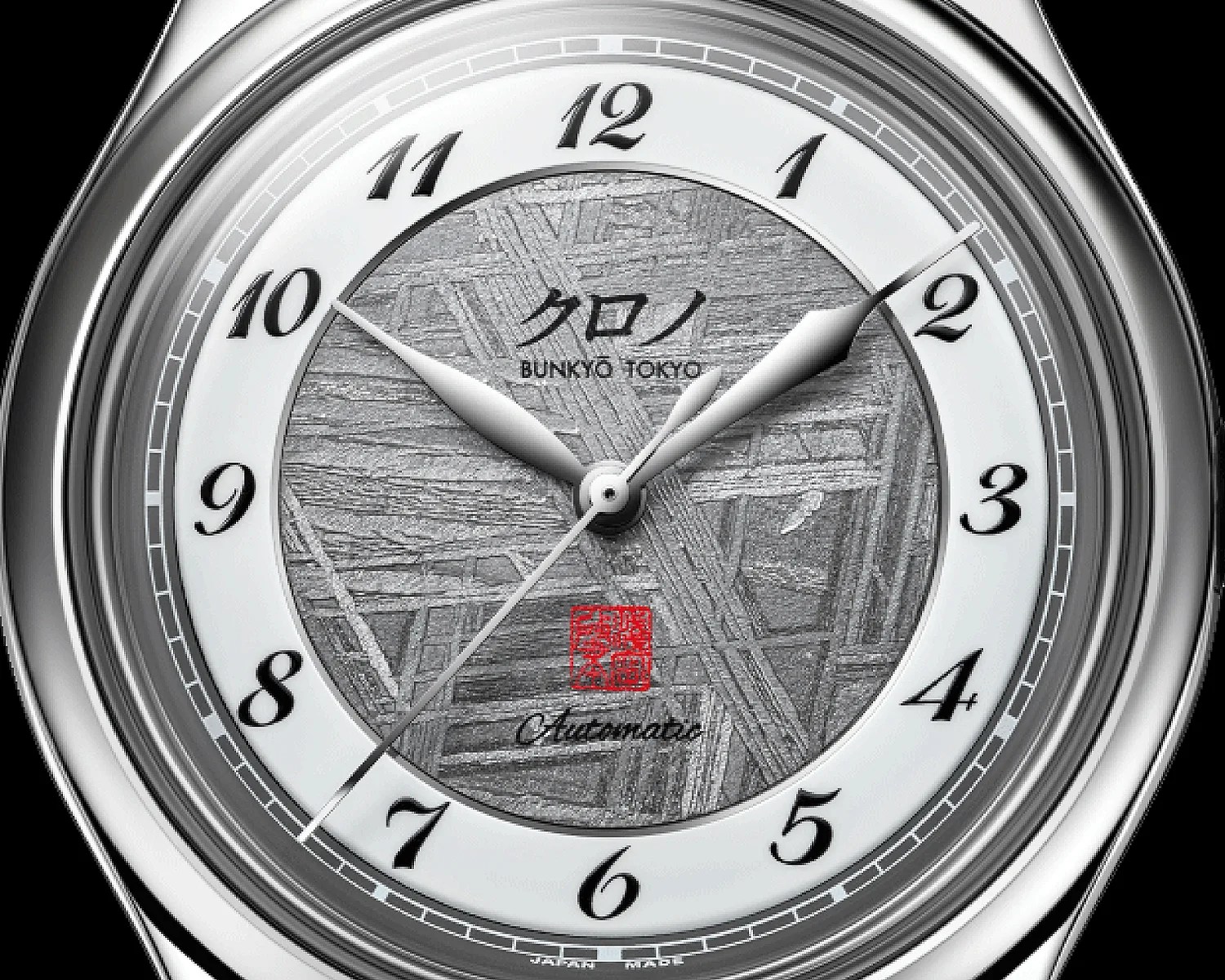 Close-up of a silver wristwatch with black Arabic numerals, textured gray dial, and "BUNKYO TOKYO" text.