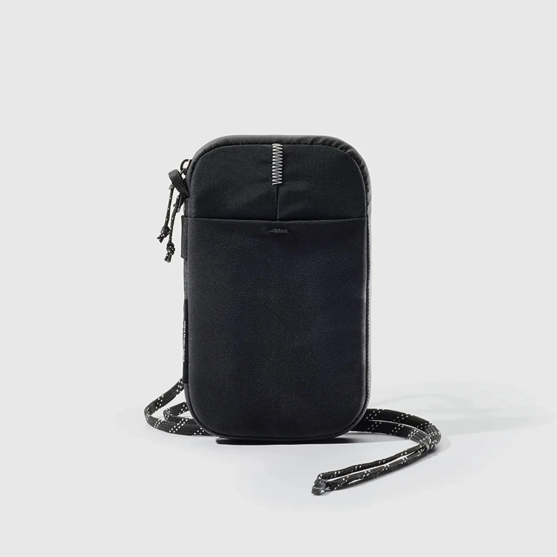 Black rectangular crossbody pouch with front pocket and adjustable cord strap on a white background.