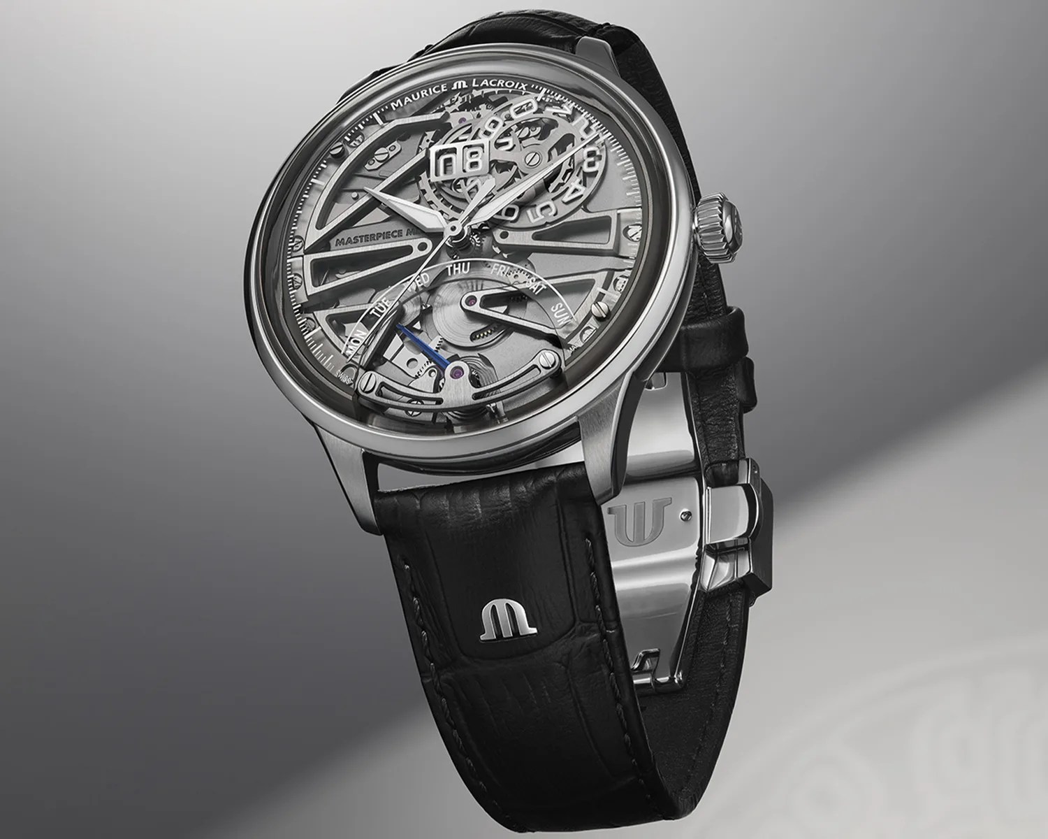 Skeleton dial Maurice Lacroix wristwatch with black leather strap and silver case.