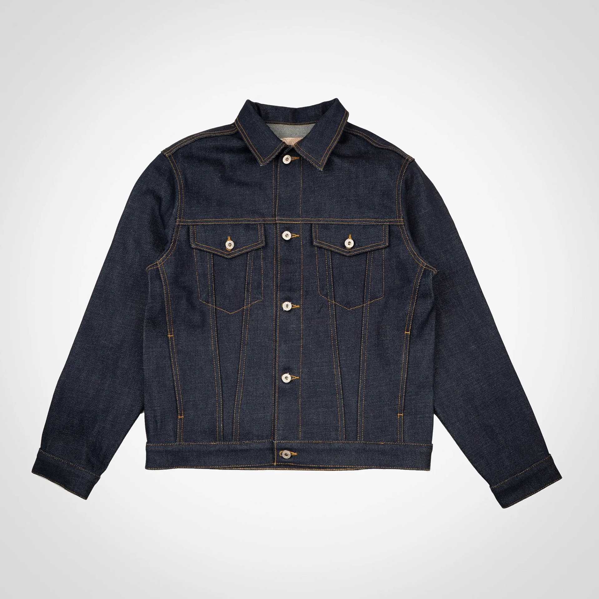 Dark blue denim jacket with button front and two chest flap pockets.