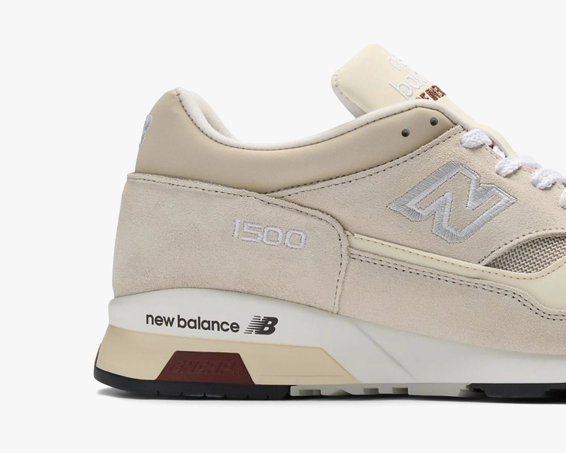 Beige and cream New Balance 1500 sneaker with suede and mesh upper and white laces.