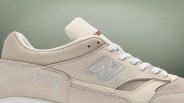 Beige New Balance 1500 sneaker with suede and mesh panels and white laces.