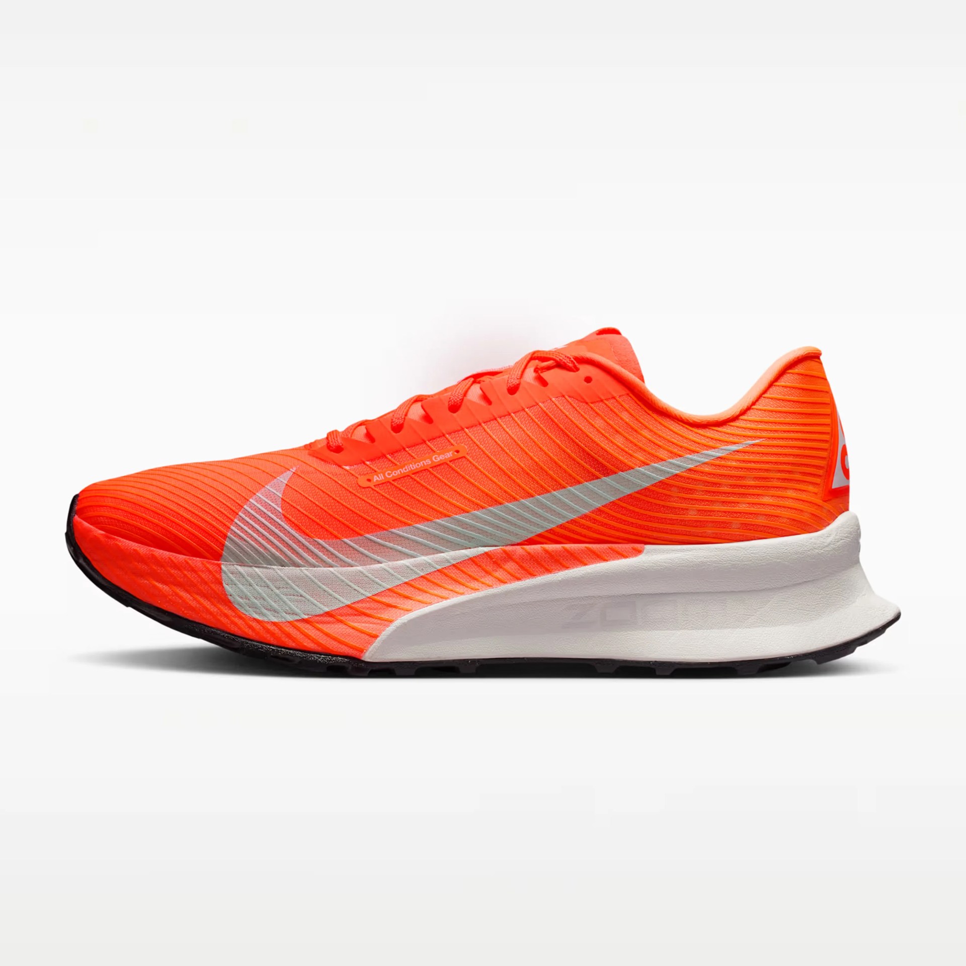 Bright orange Nike running shoe with a large silver swoosh and white cushioned sole.
