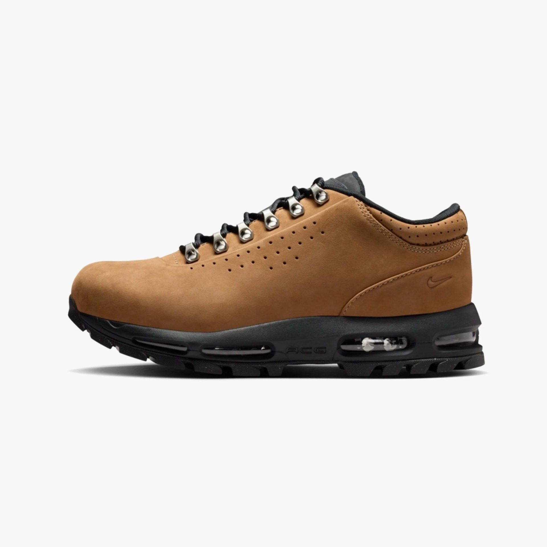 Brown leather hiking shoe with black sole and metal eyelets, side view.