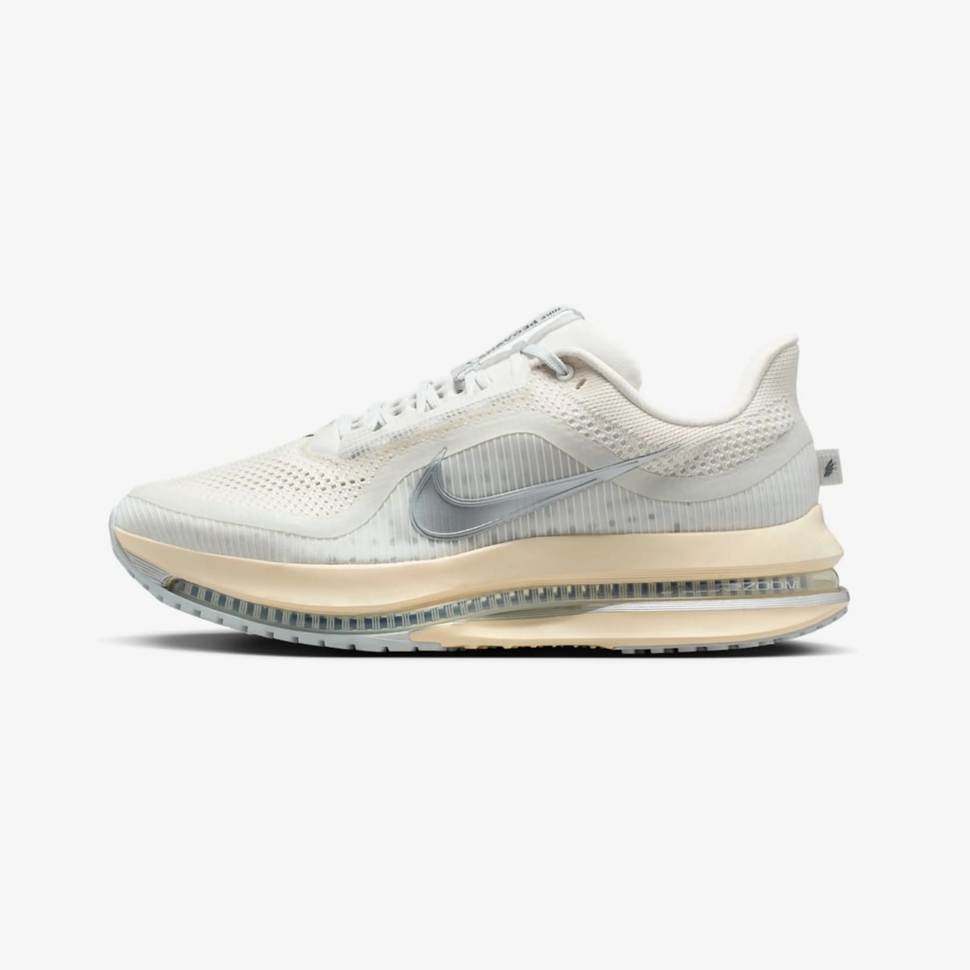 Off-white Nike running shoe with translucent upper, beige midsole, and visible air cushioning sole.
