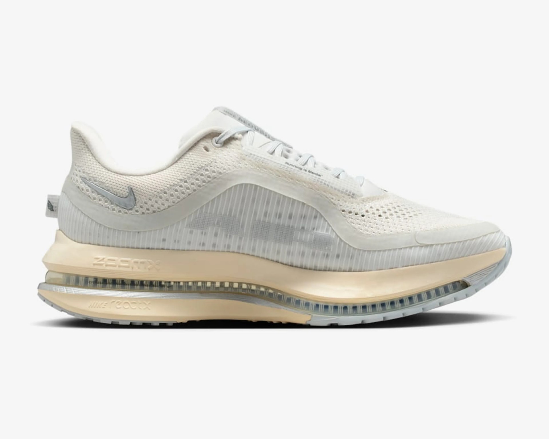 Off-white Nike ZoomX running shoe with translucent mesh upper and beige cushioned sole.