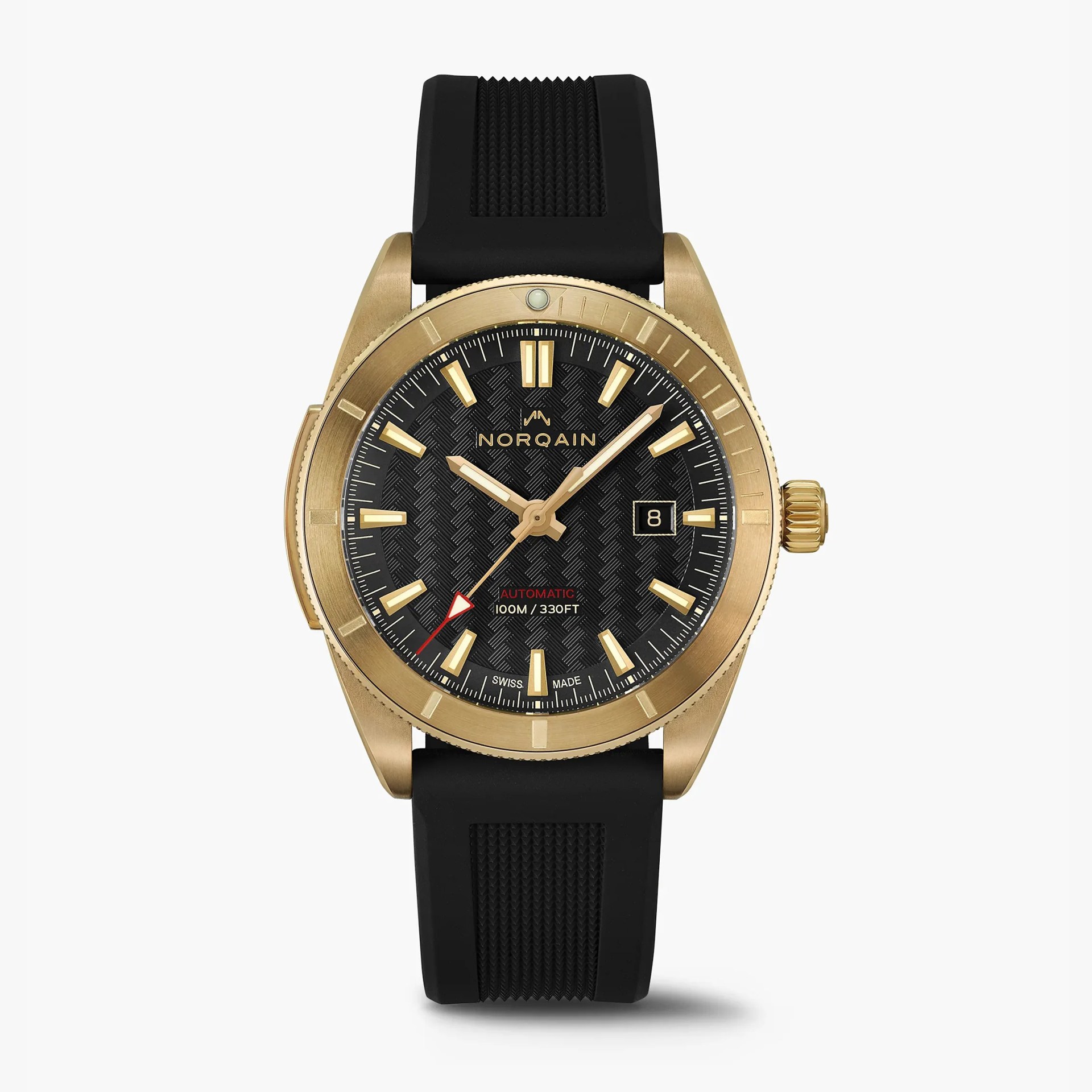 Gold-tone Norqain wristwatch with black textured dial, gold markers, date window, and black rubber strap.