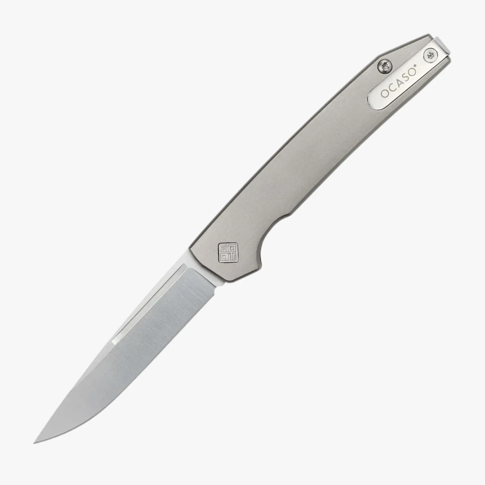 Silver folding knife with a straight-edged blade and a matte gray handle engraved with "OCASO.