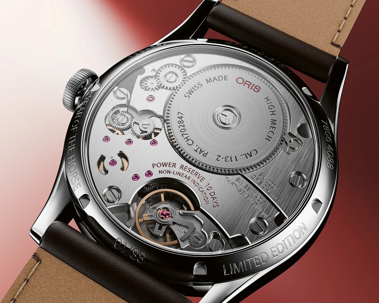 Close-up of the back of an Oris limited edition mechanical watch showing intricate gears and leather strap.