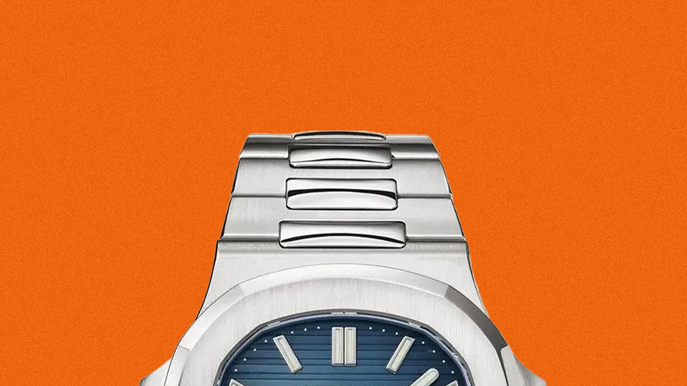 Stainless steel wristwatch with a blue textured dial and silver hour markers on an orange background.