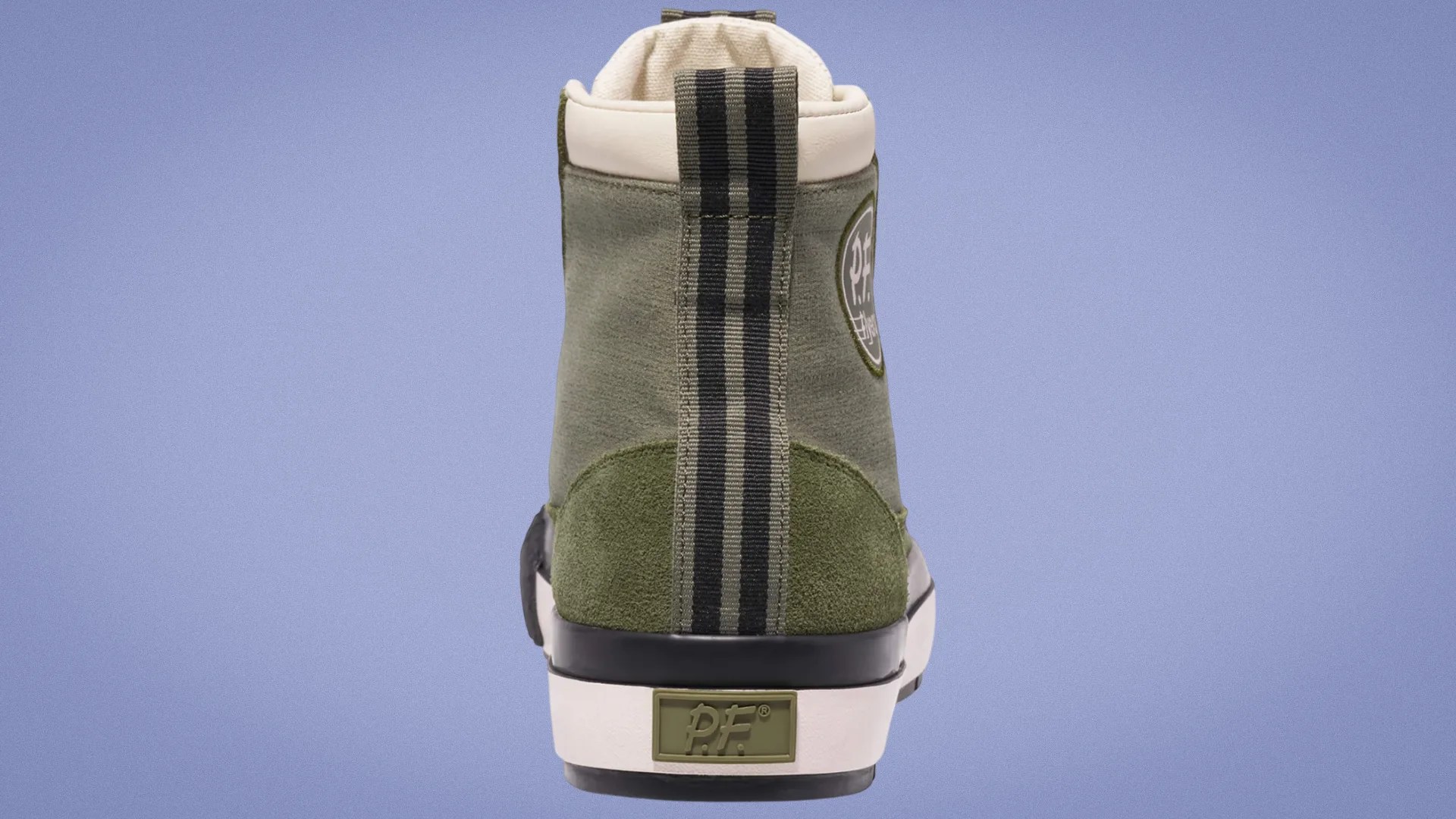 back view of pf flyers shoe on purple background