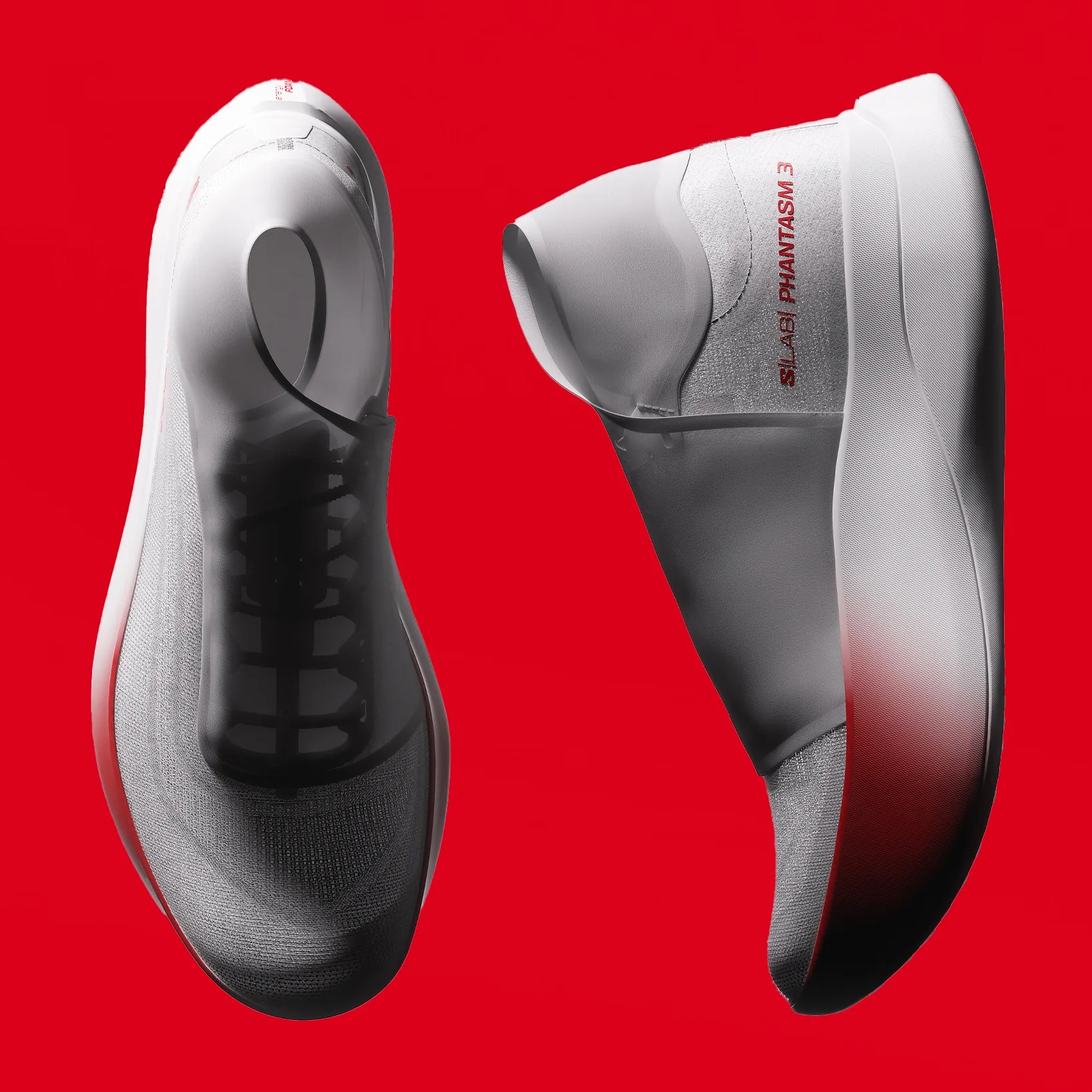 Pair of white and gray athletic shoes with translucent upper and red "S/LAB PHANTASM 3" text on the side, shown against a red background.