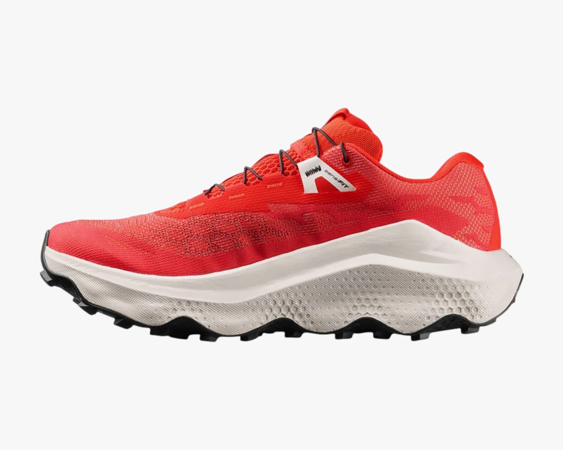 Bright red athletic shoe with white thick sole and black tread, featuring a mesh upper and black laces.