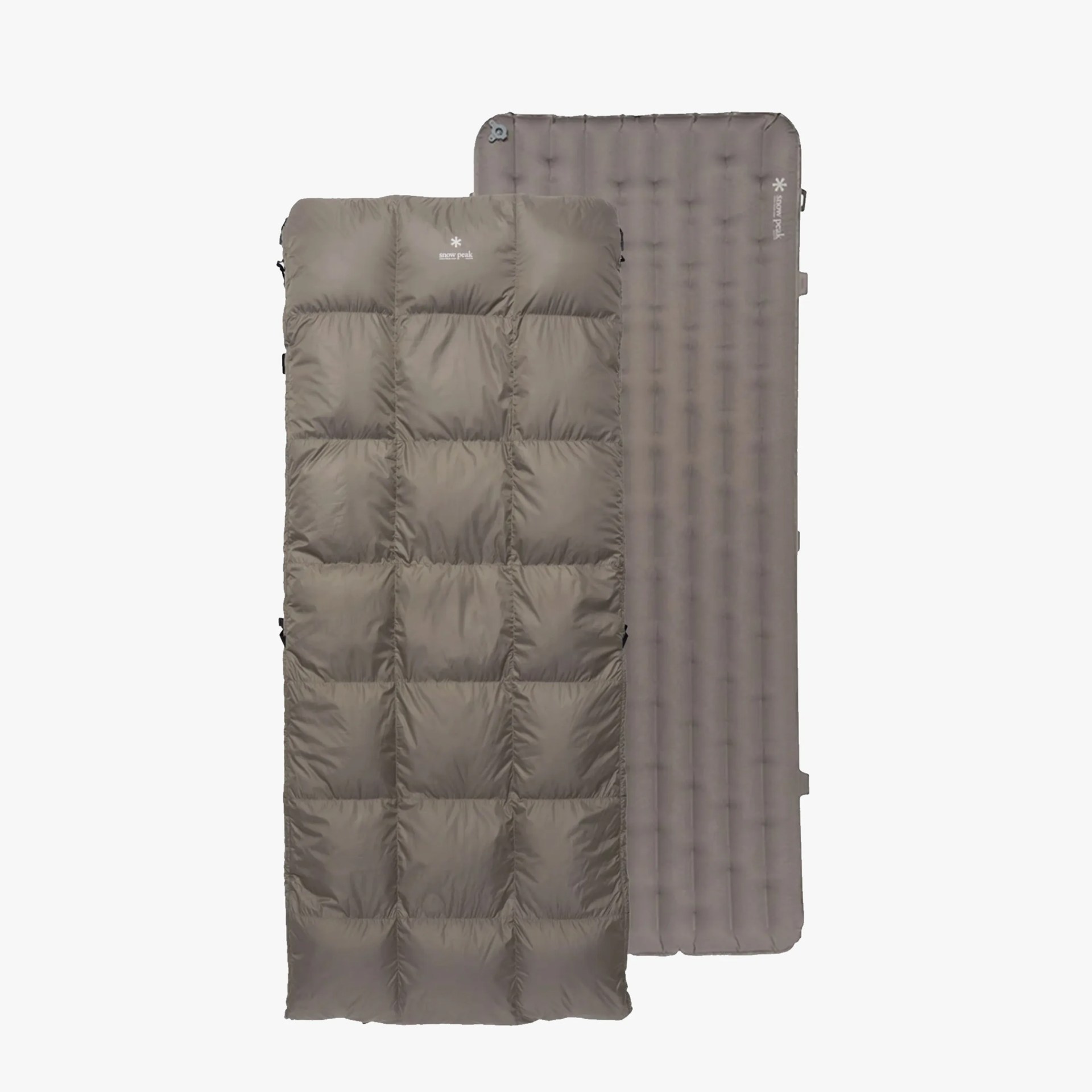 Two taupe-colored Snow Peak camping sleeping pads, one quilted and one inflatable, shown side by side.
