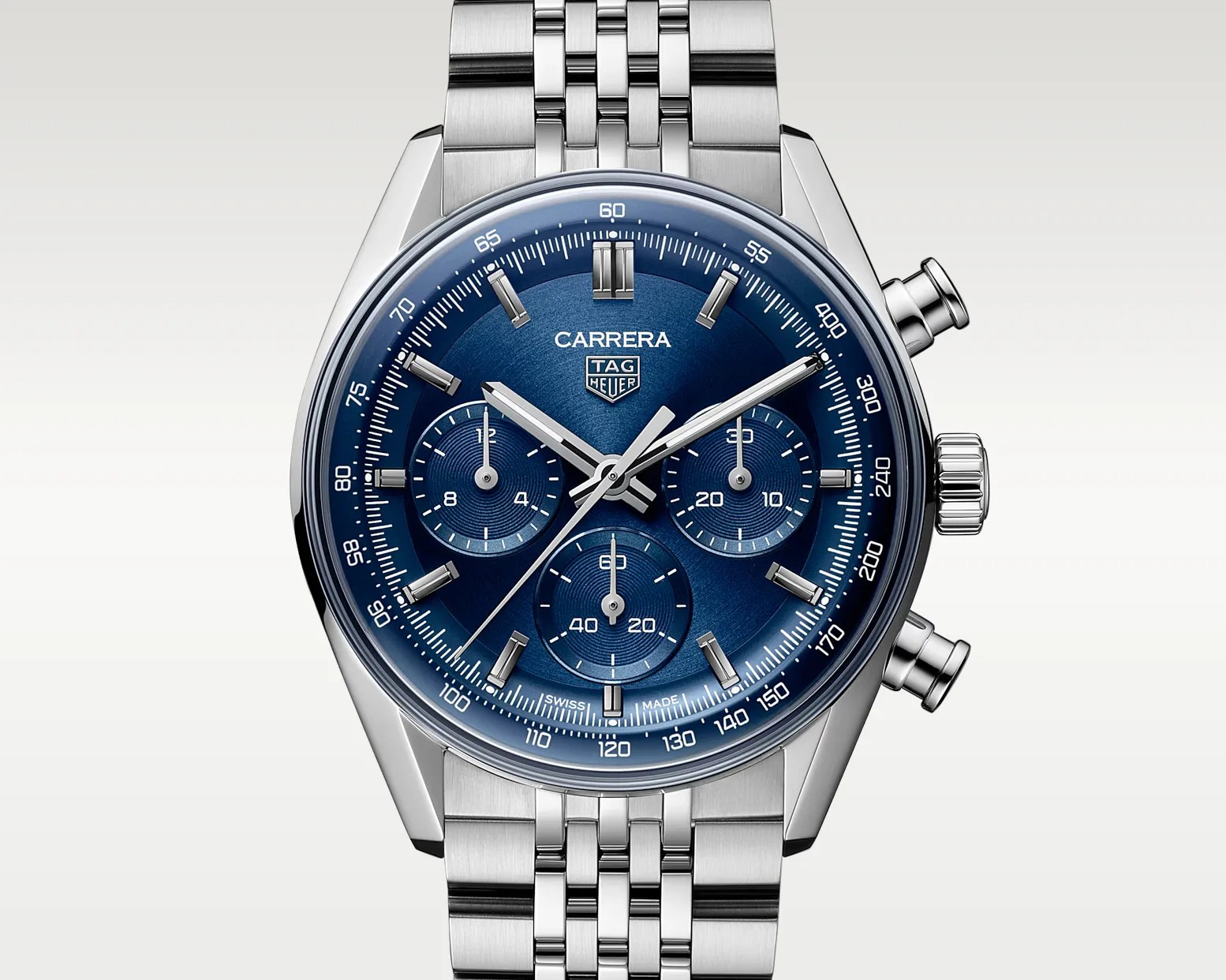 Silver TAG Heuer Carrera chronograph watch with a blue dial and stainless steel bracelet.