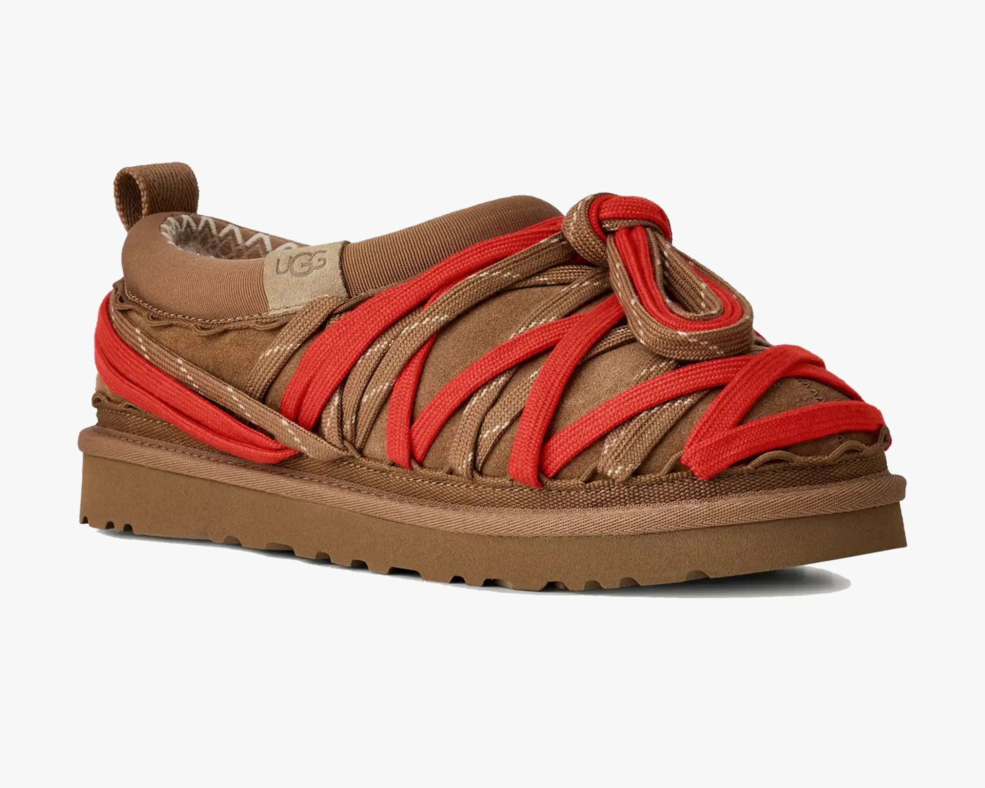 Brown suede slip-on shoe with red and brown rope laces and a thick rubber sole.