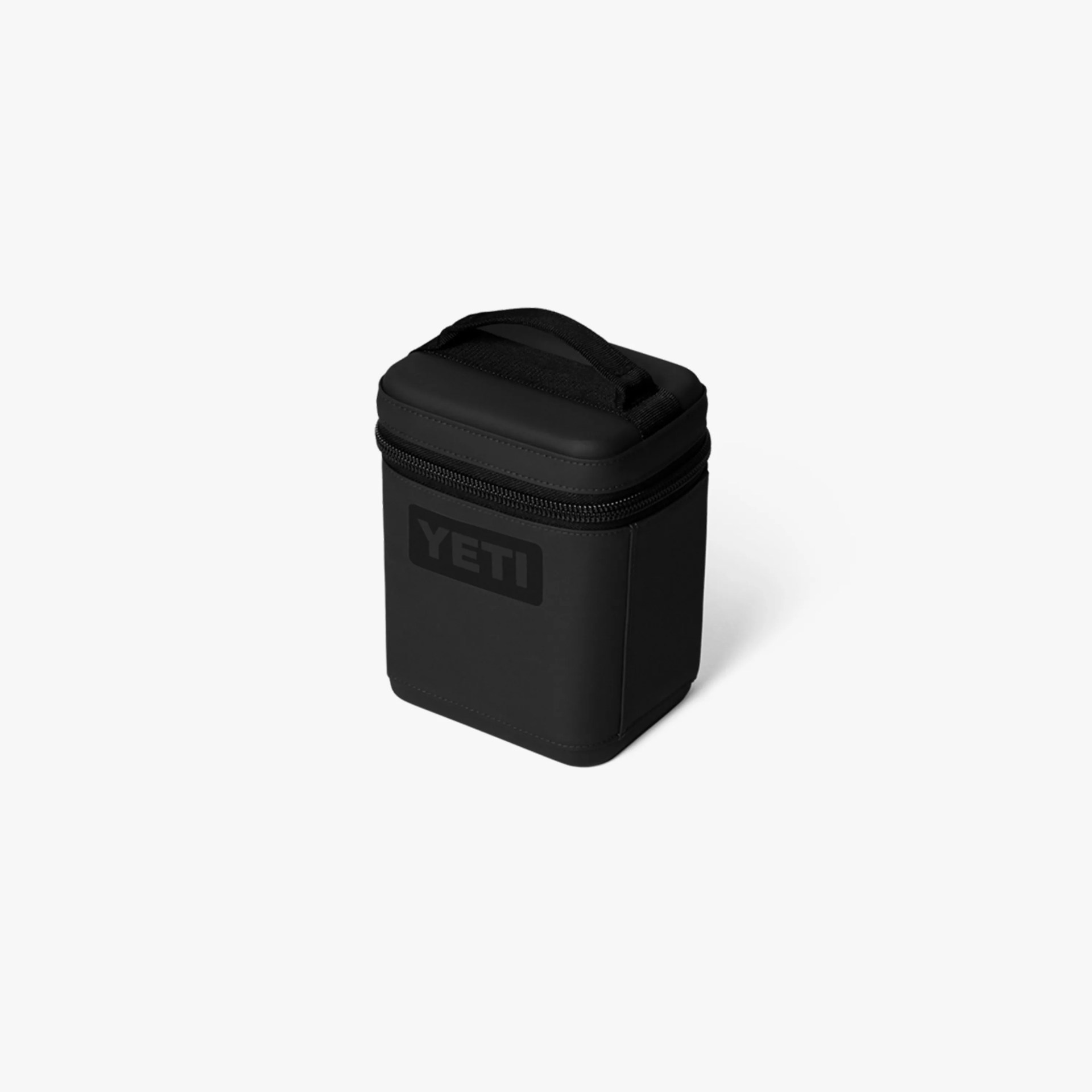 Black YETI soft cooler bag with zipper and top handle on a white background.
