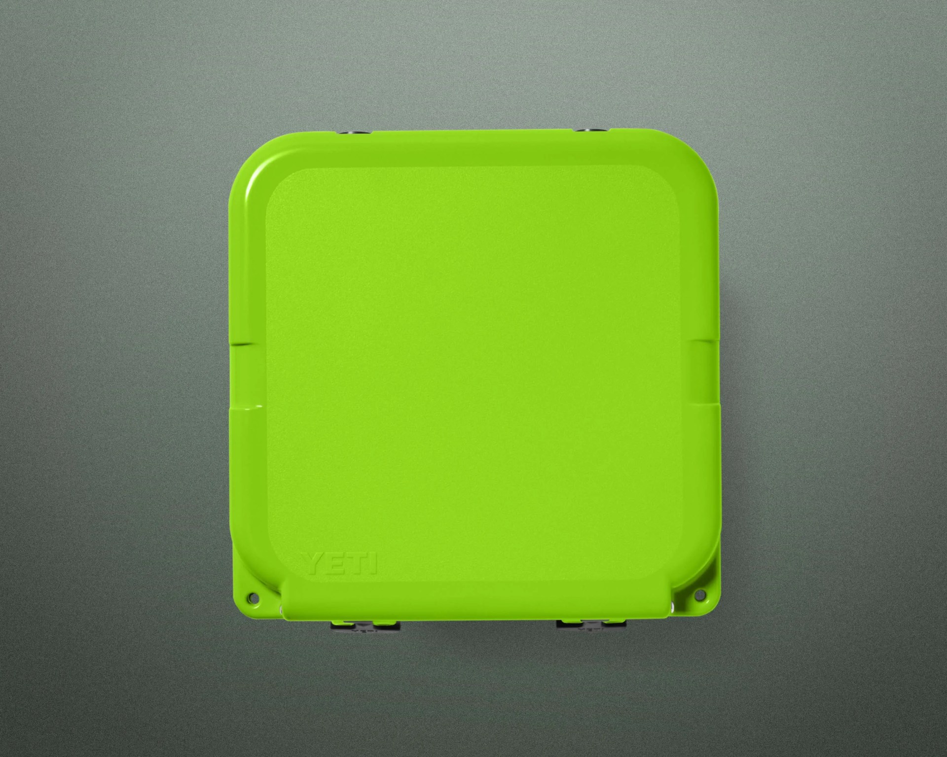 Bright green square YETI cooler with rounded corners on a gray background.