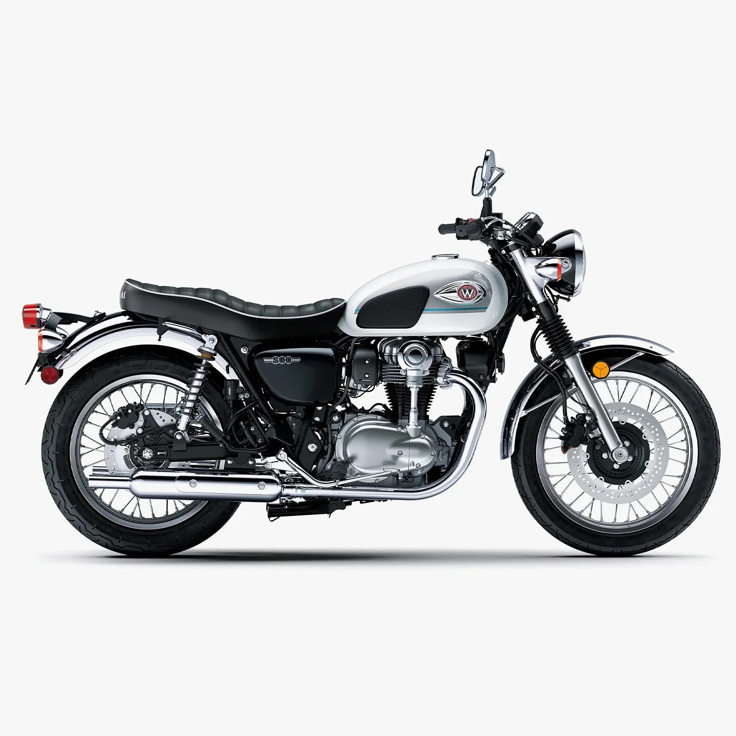 White and black classic-style motorcycle with chrome exhaust and round headlight on a white background.