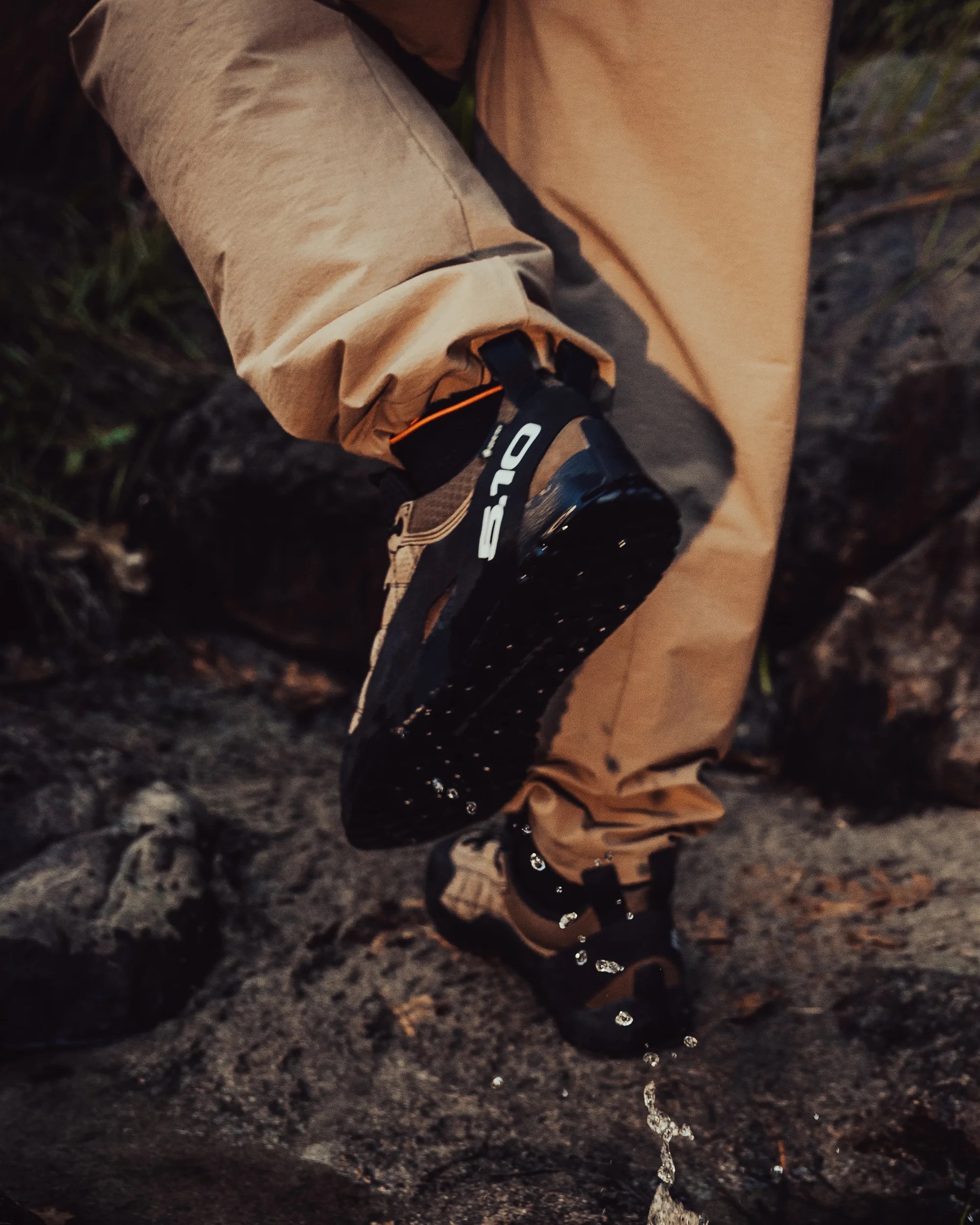 Brown and black hiking shoes with 