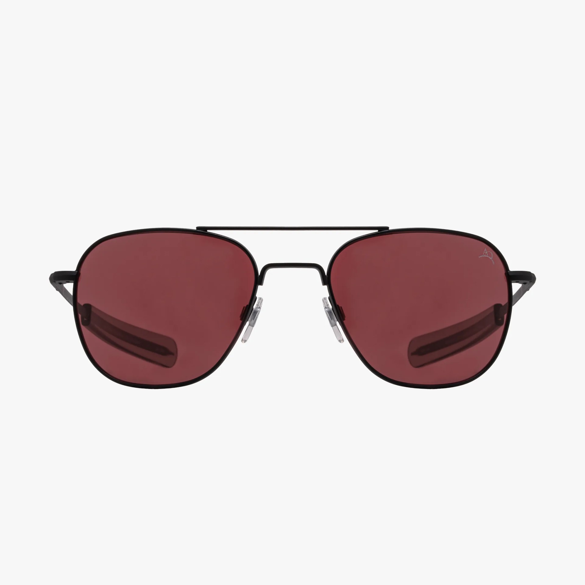 Black metal aviator sunglasses with dark red lenses and clear nose pads.