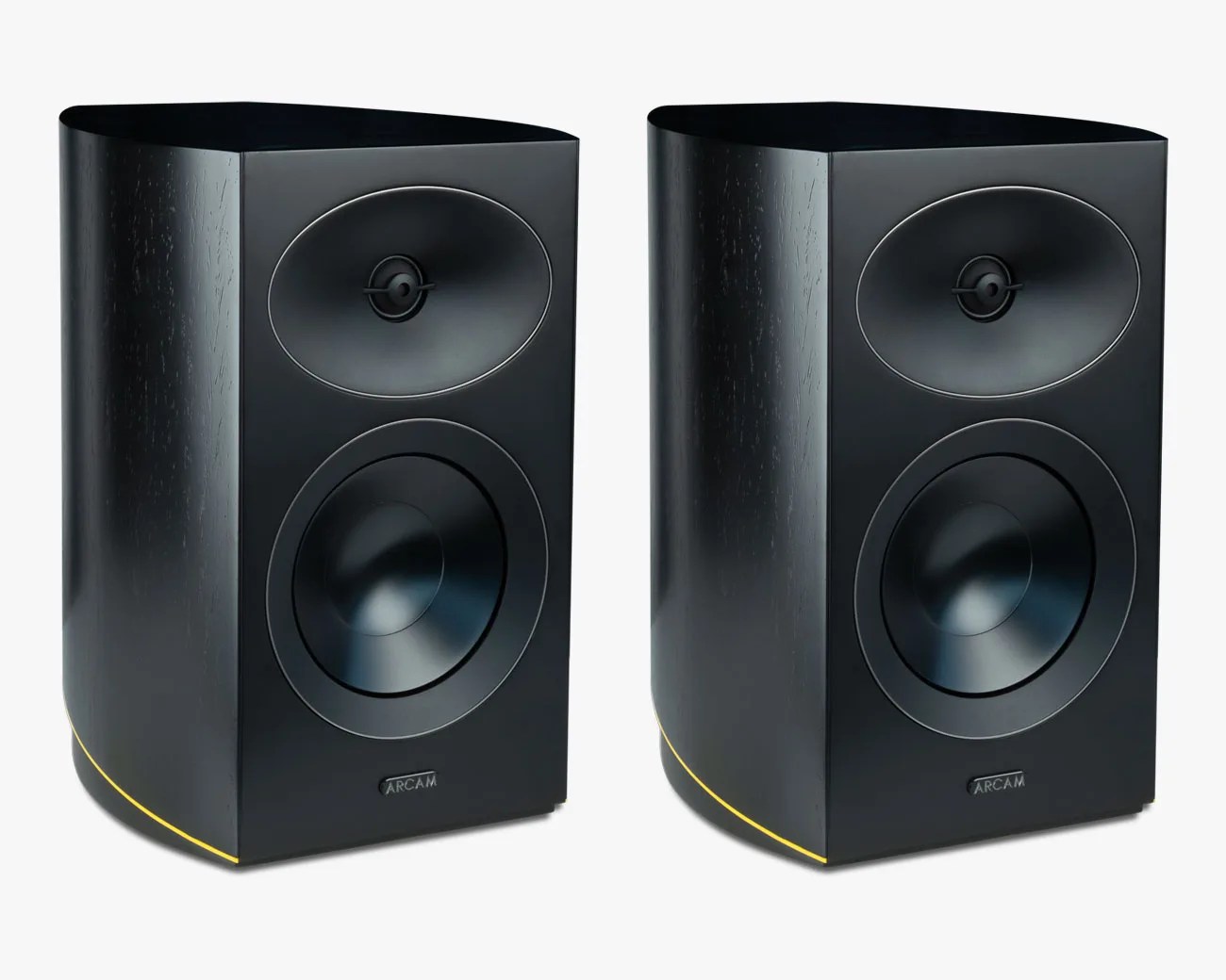 Pair of black Arcam bookshelf speakers with rounded edges and yellow accent lines at the bottom.