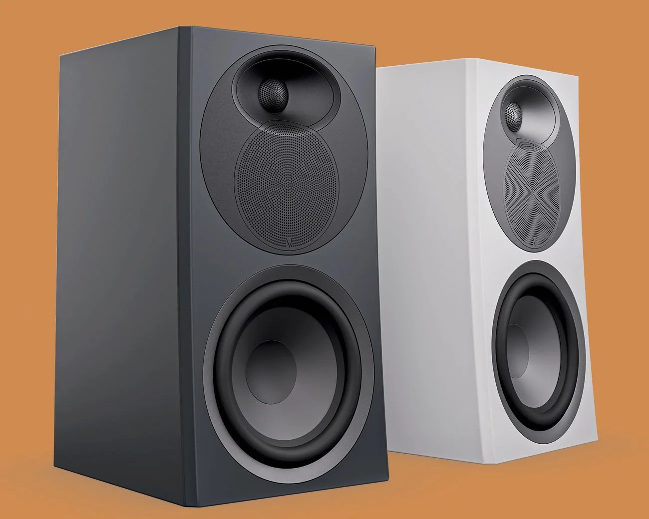 Pair of modern rectangular speakers, one black and one white, with circular drivers and tweeters on an orange background.